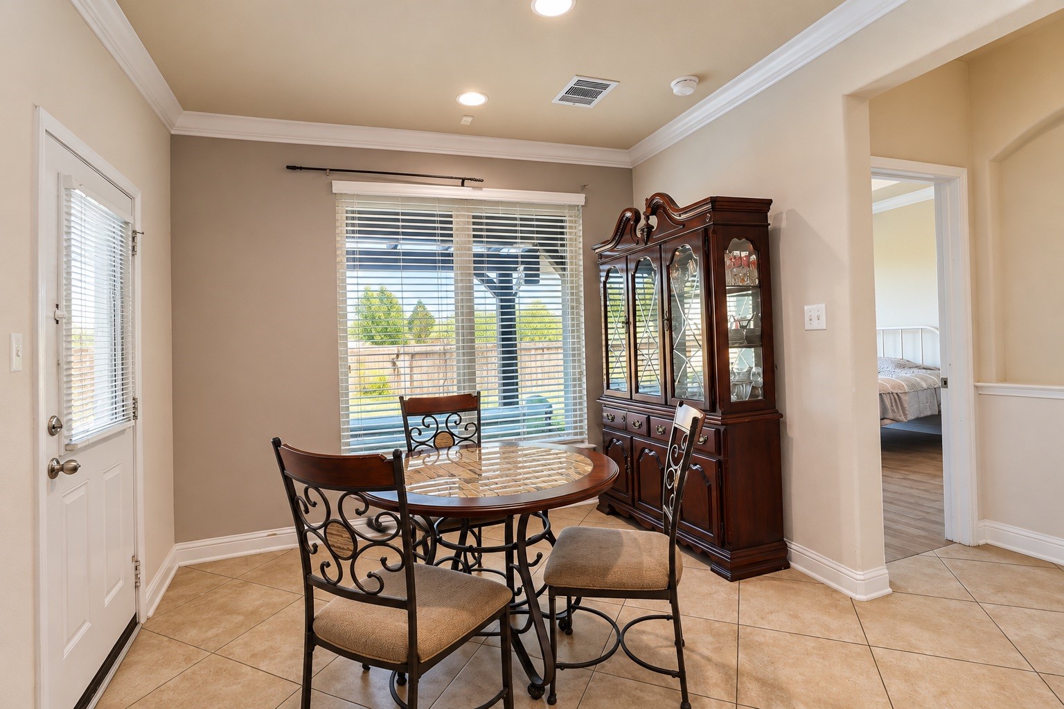 Separate Dining Area with a backyard view, large windows