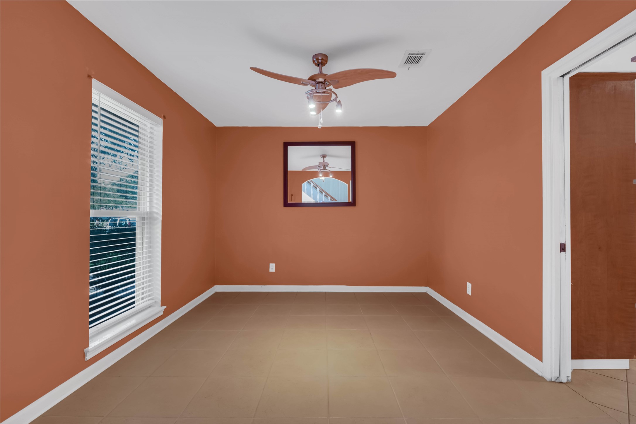 Generously sized formal dining room offering an elegant setting for intimate dinners and memorable gatherings. Generously sized formal dining room offering an elegant setting for intimate dinners and memorable gatherings.