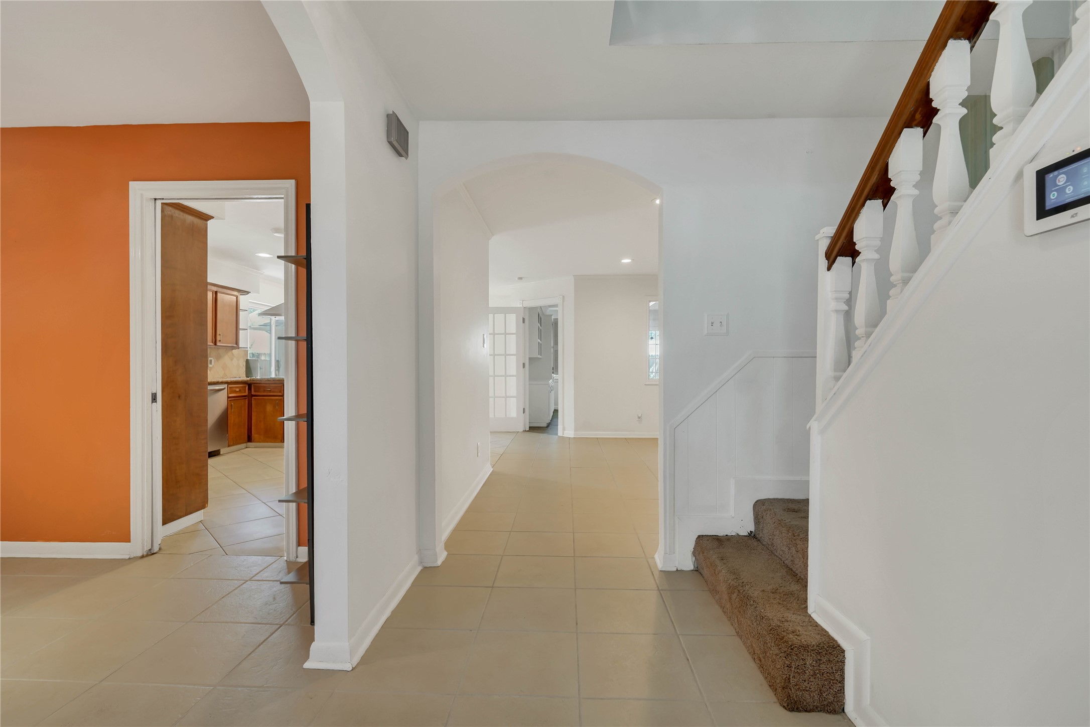 A gracious entryway introduces the home, with the formal dining room to the left, staircase to the right, and an inviting sightline into the living room beyond. A gracious entryway introduces the home, with the formal dining room to the left, staircase to the right, and an inviting sightline into the living room beyond.