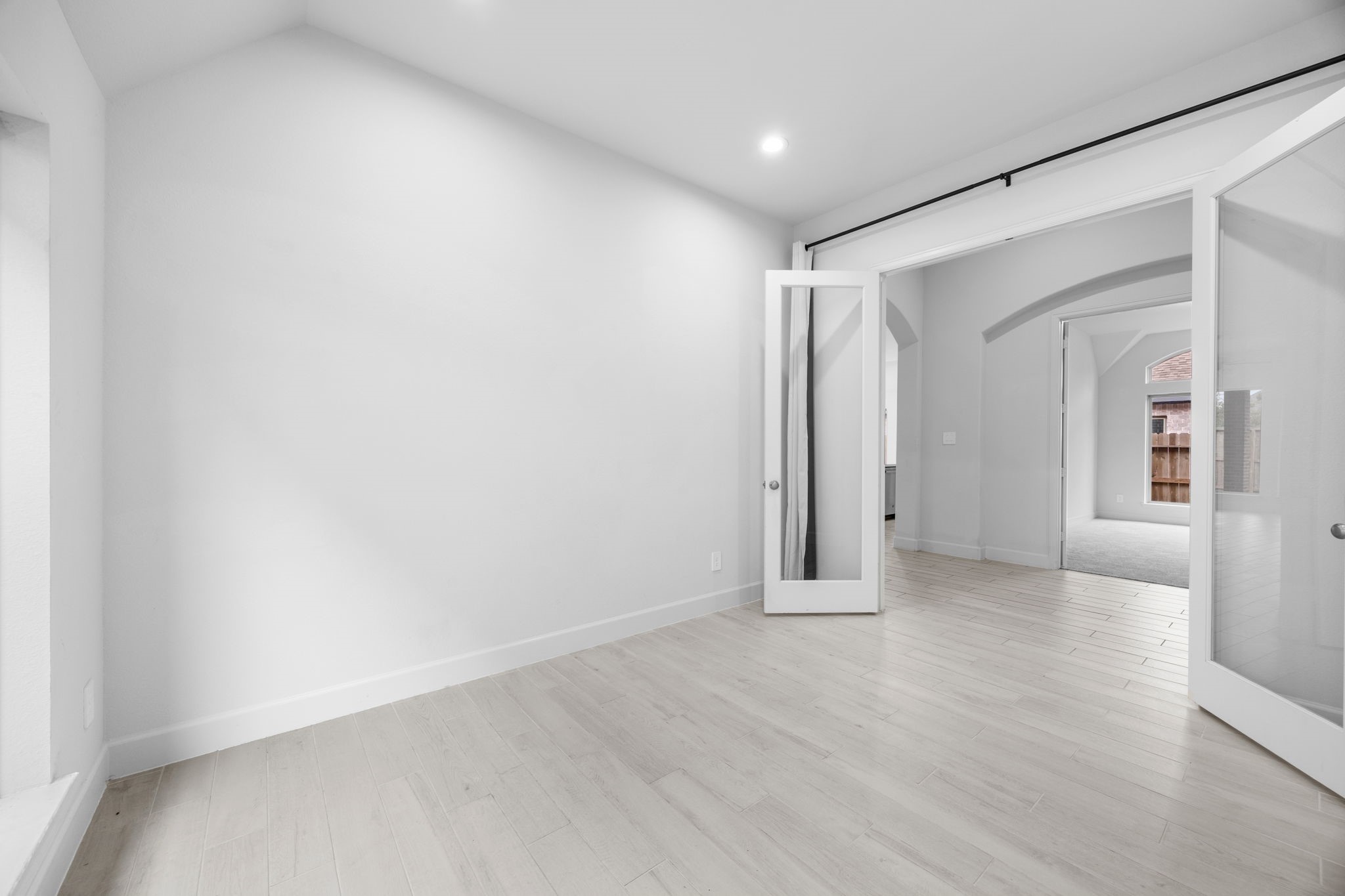 Spacious secondary living area offers endless possibilities for relaxing, entertaining, or working from home.