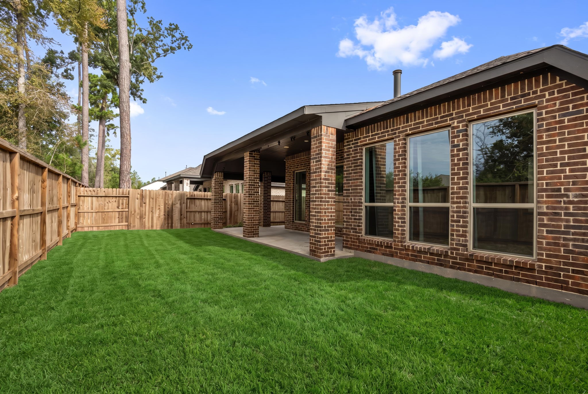 Generously sized backyard offers plenty of room for outdoor activities, gardening, or creating your ideal outdoor retreat.