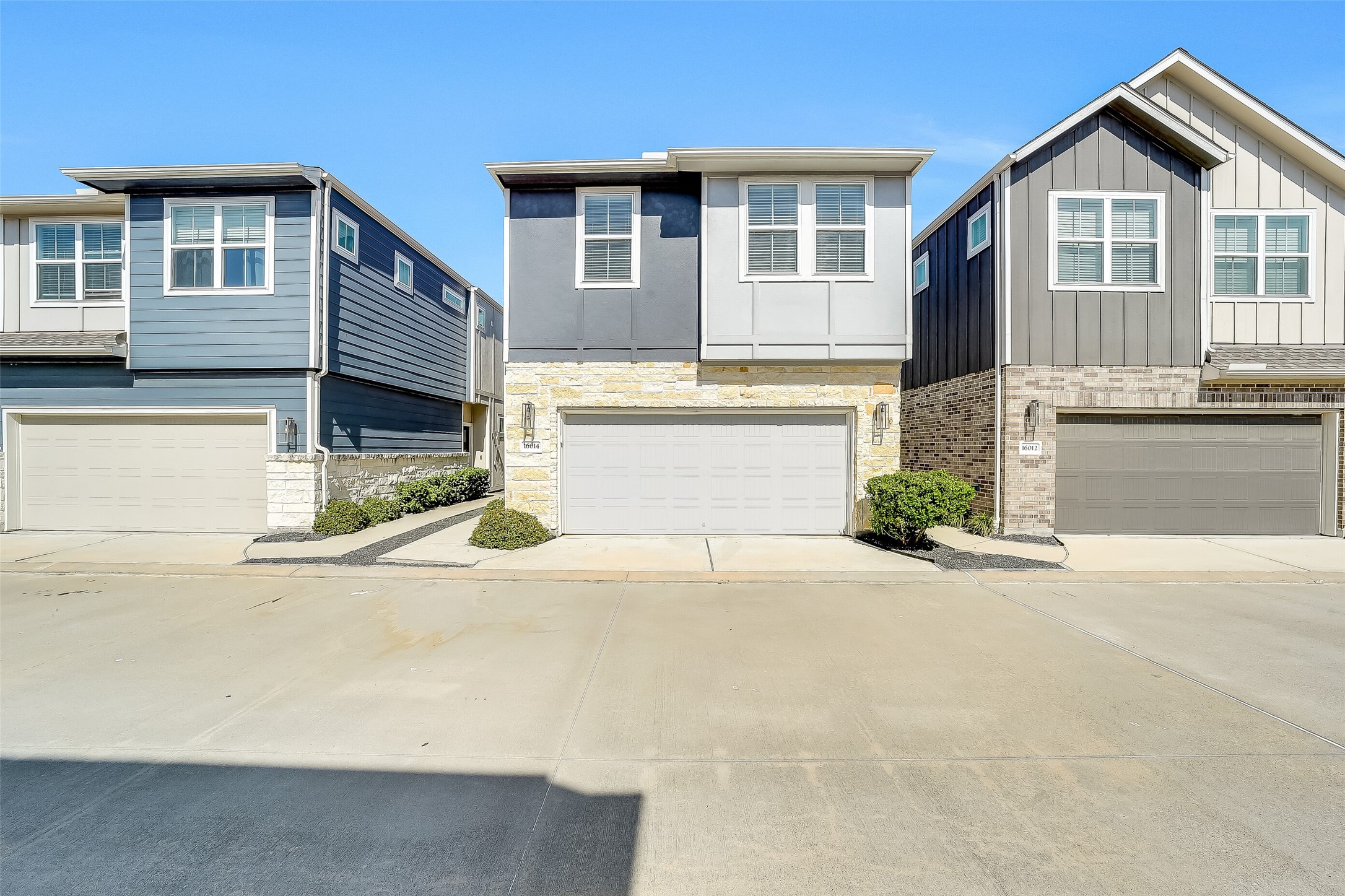 Stone accents and contemporary lines create a welcoming first impression, with a two-car garage conveniently positioned at the front of the home. Stone accents and contemporary lines create a welcoming first impression, with a two-car garage conveniently positioned at the front of the home.