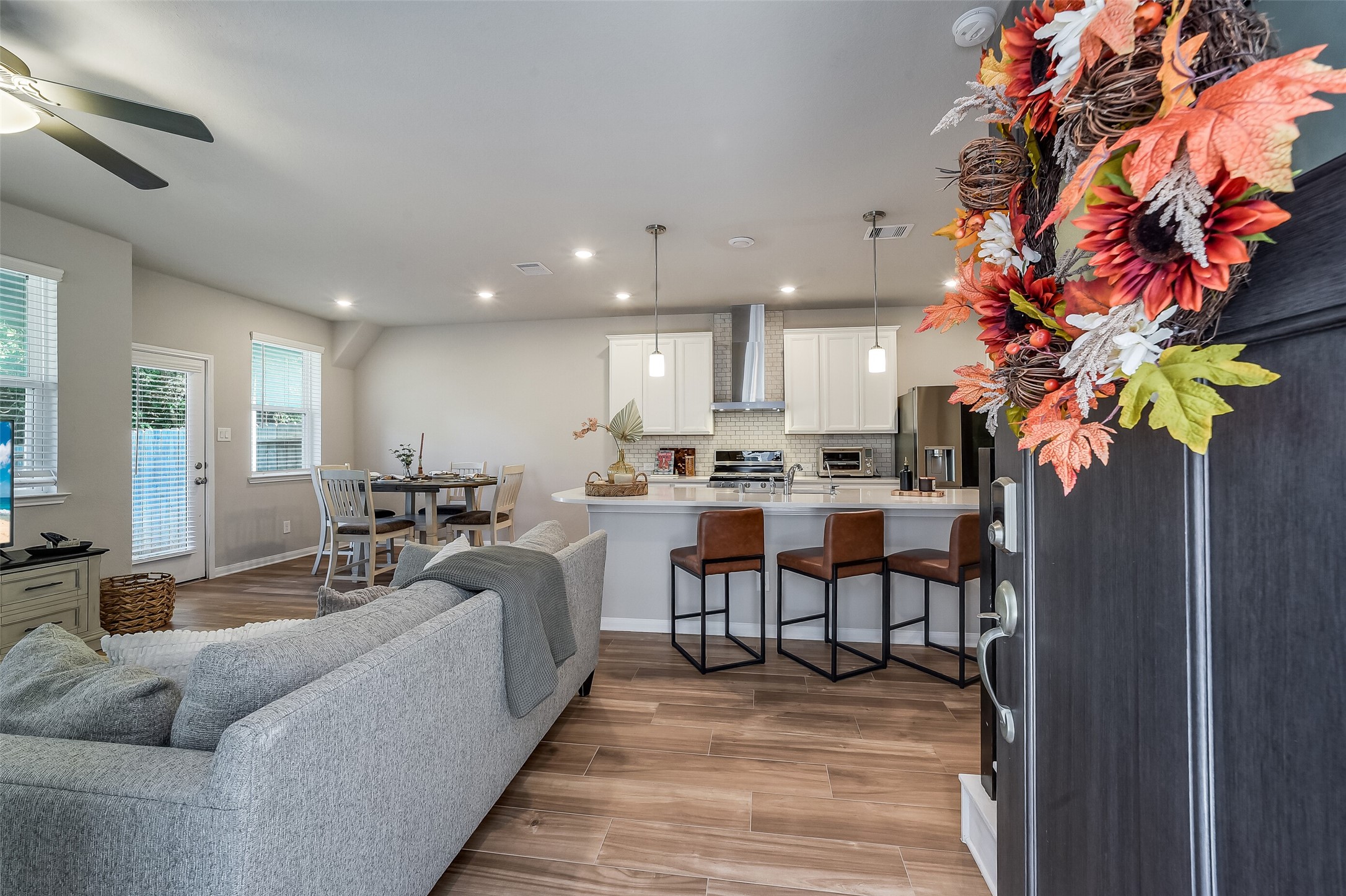 Step into an inviting main living area where the living room, kitchen, and dining space connect, keeping everyday life and conversation together. Step into an inviting main living area where the living room, kitchen, and dining space connect, keeping everyday life and conversation together.