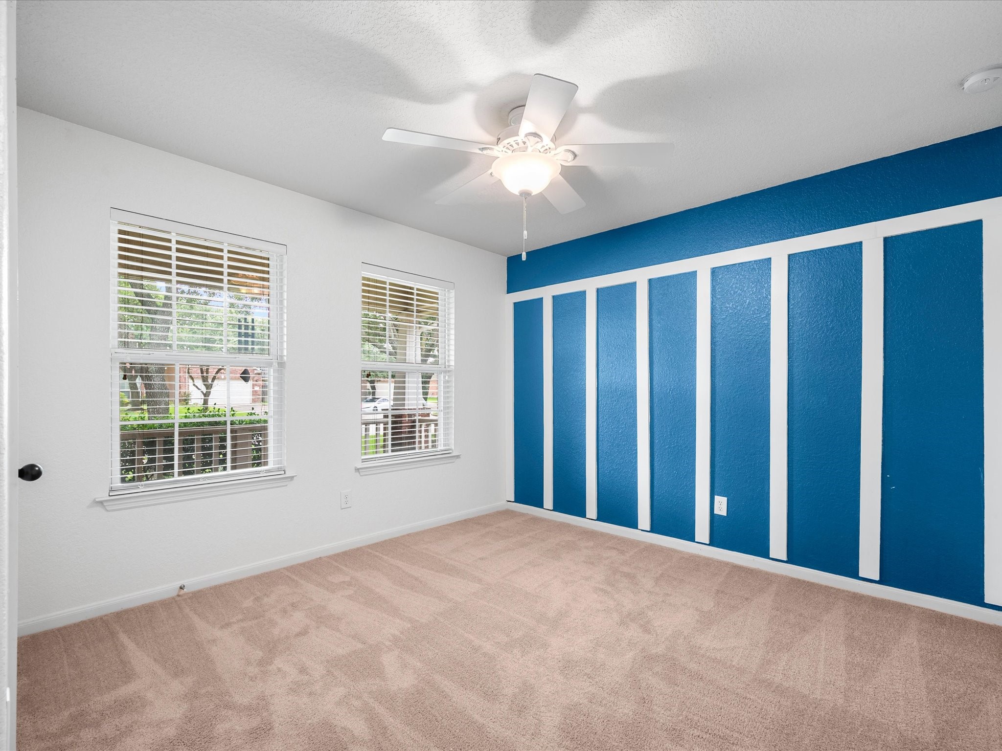 Secondary bedrooms provide flexibility for family, guests, hobbies, or additional personal space.