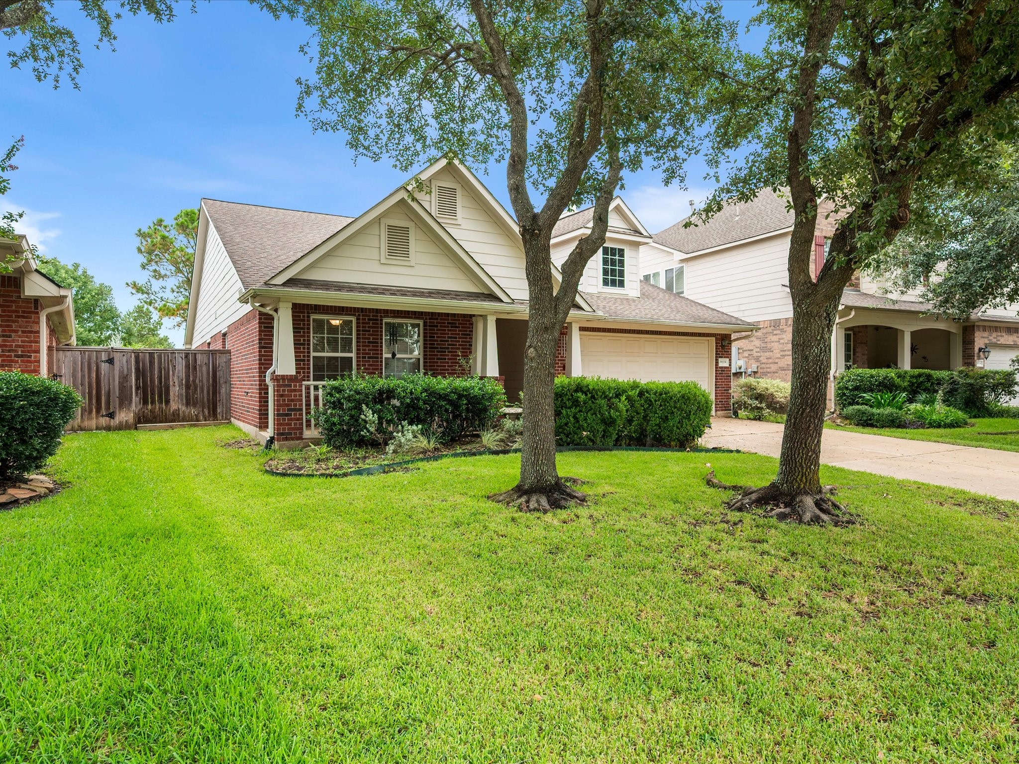 The inviting front porch creates a warm first impression with a welcoming view of the front entry and a comfortable space to enjoy the outdoors.