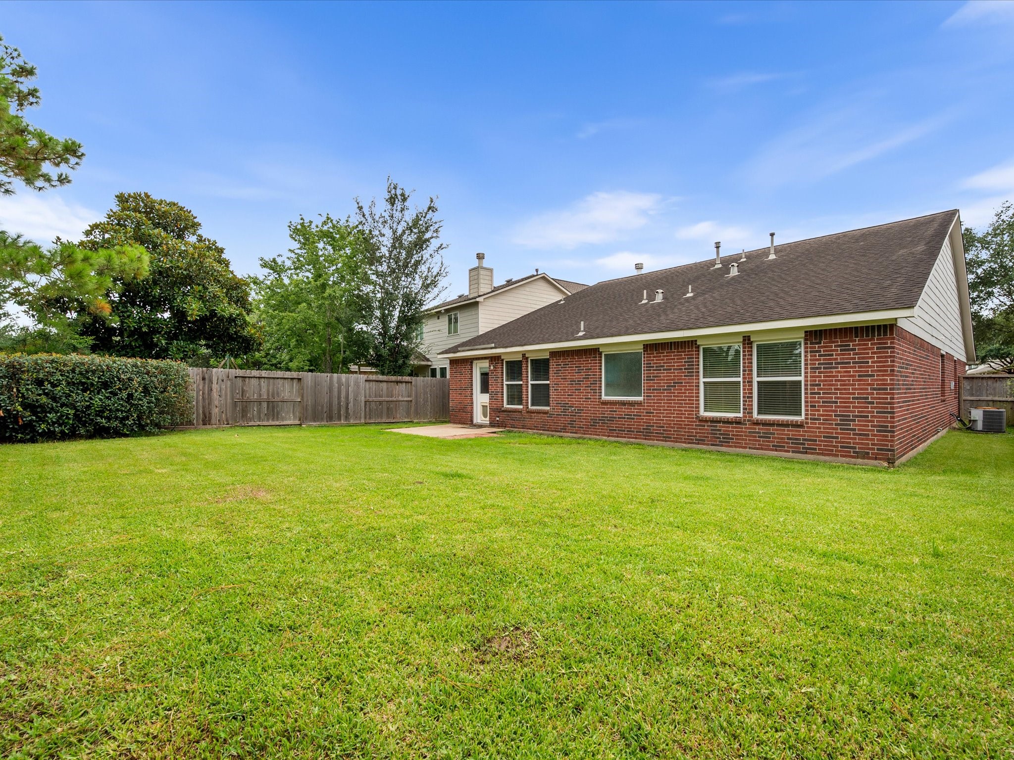 The backyard provides a peaceful extension of the living space with room to relax and enjoy the outdoors.