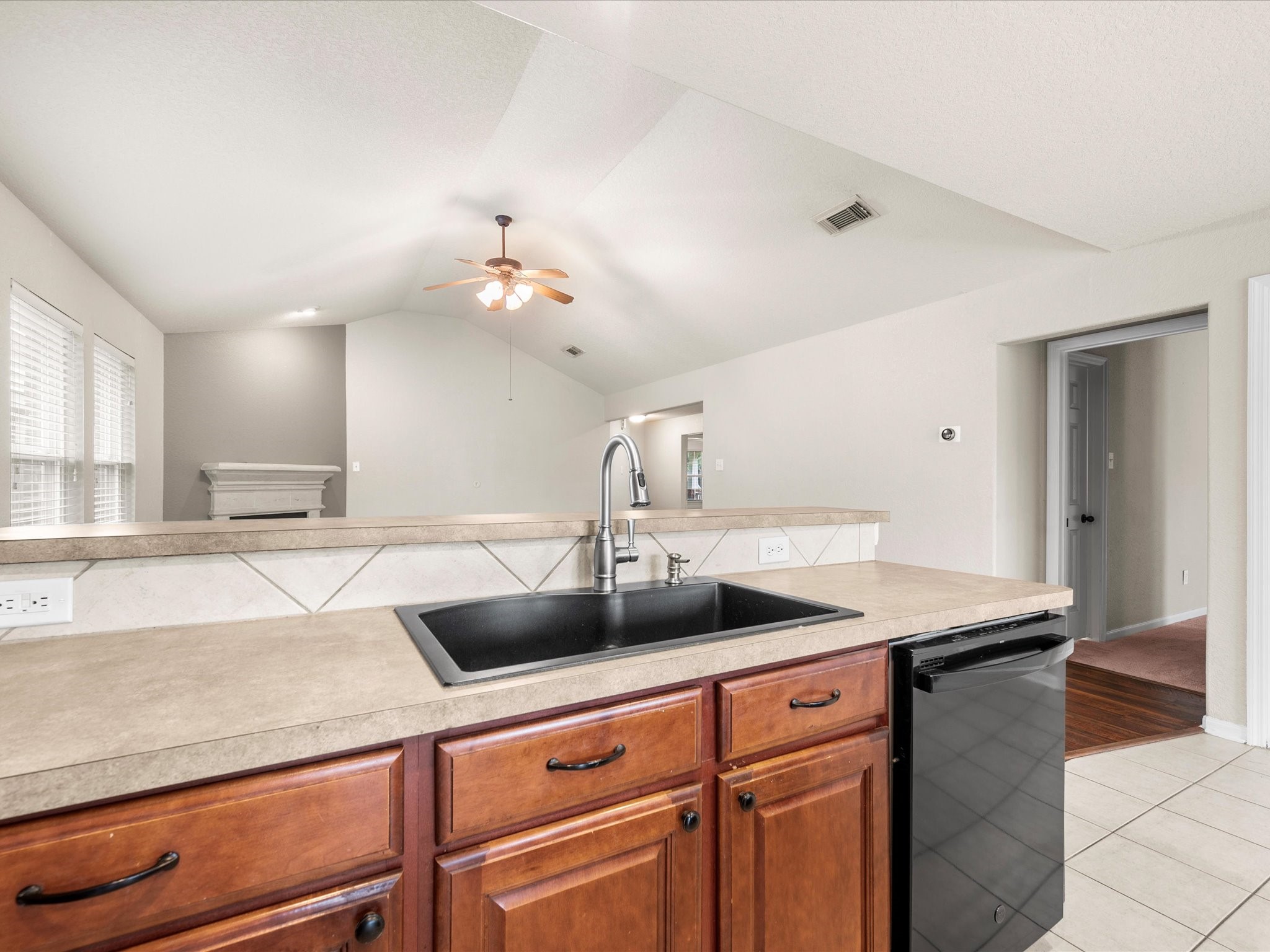 The kitchen seamlessly connects to the family room and breakfast nook, creating a functional layout designed for both daily routines and gatherings.