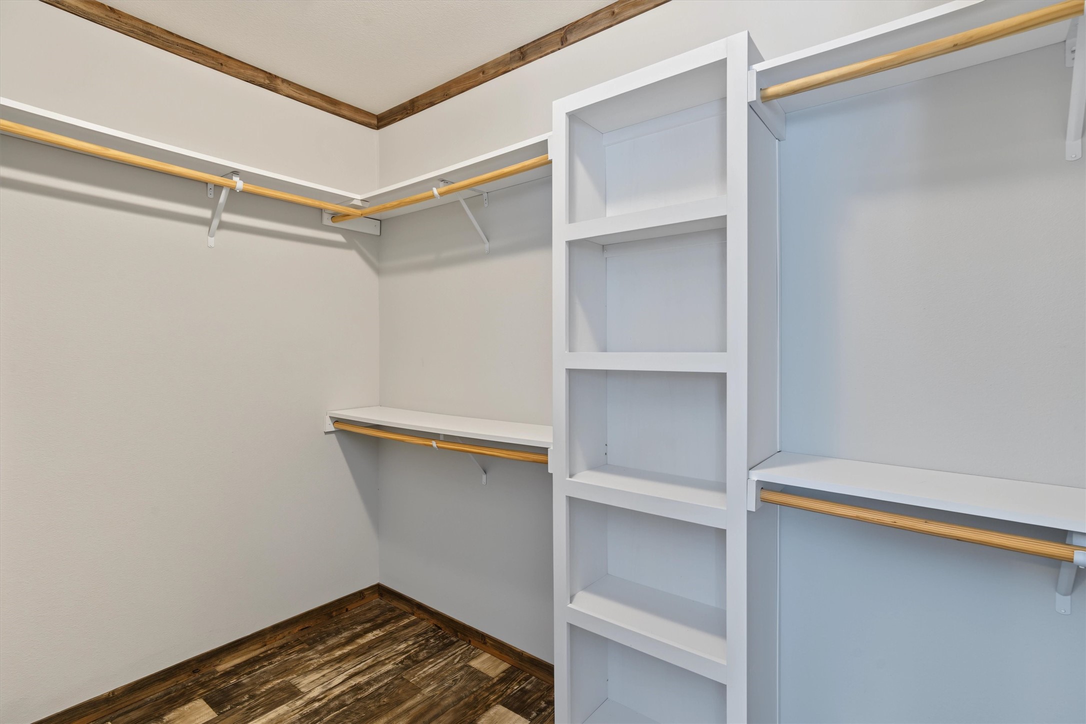 Plenty of storage and built in shelving in the primary bedroom closet