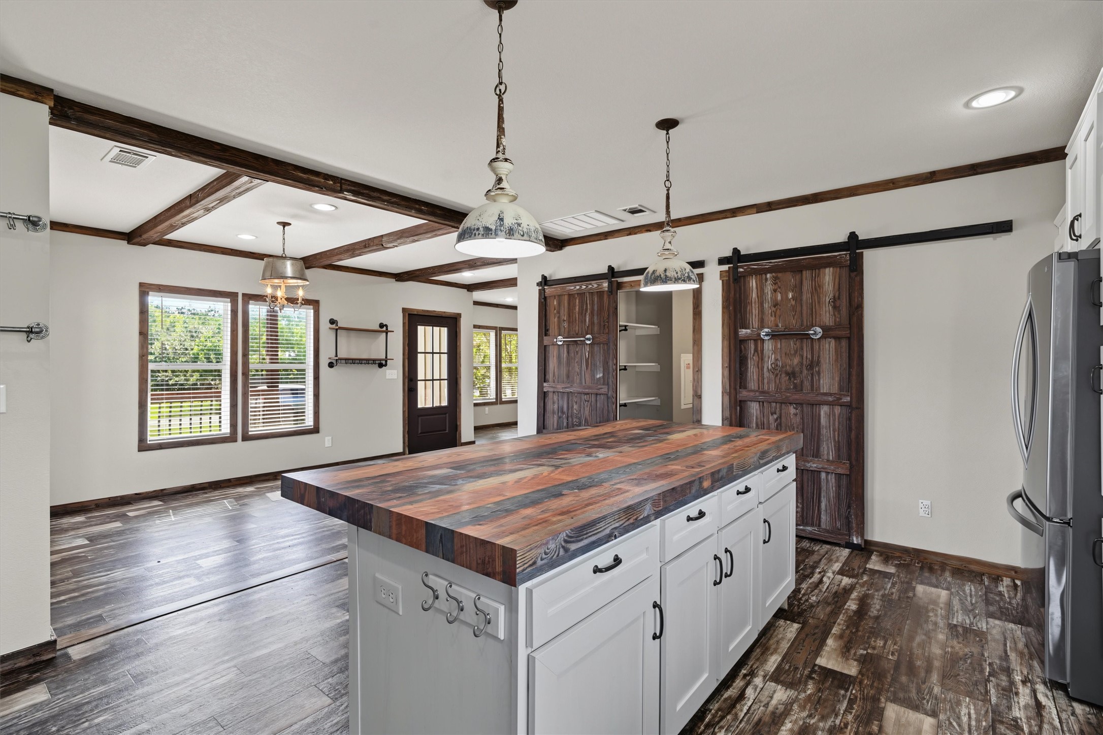 Seamless Open-Concept Design  The spacious kitchen flows effortlessly into the dining and living areas, creating a bright, inviting space thats perfect for family gatherings, entertaining, and everyday living