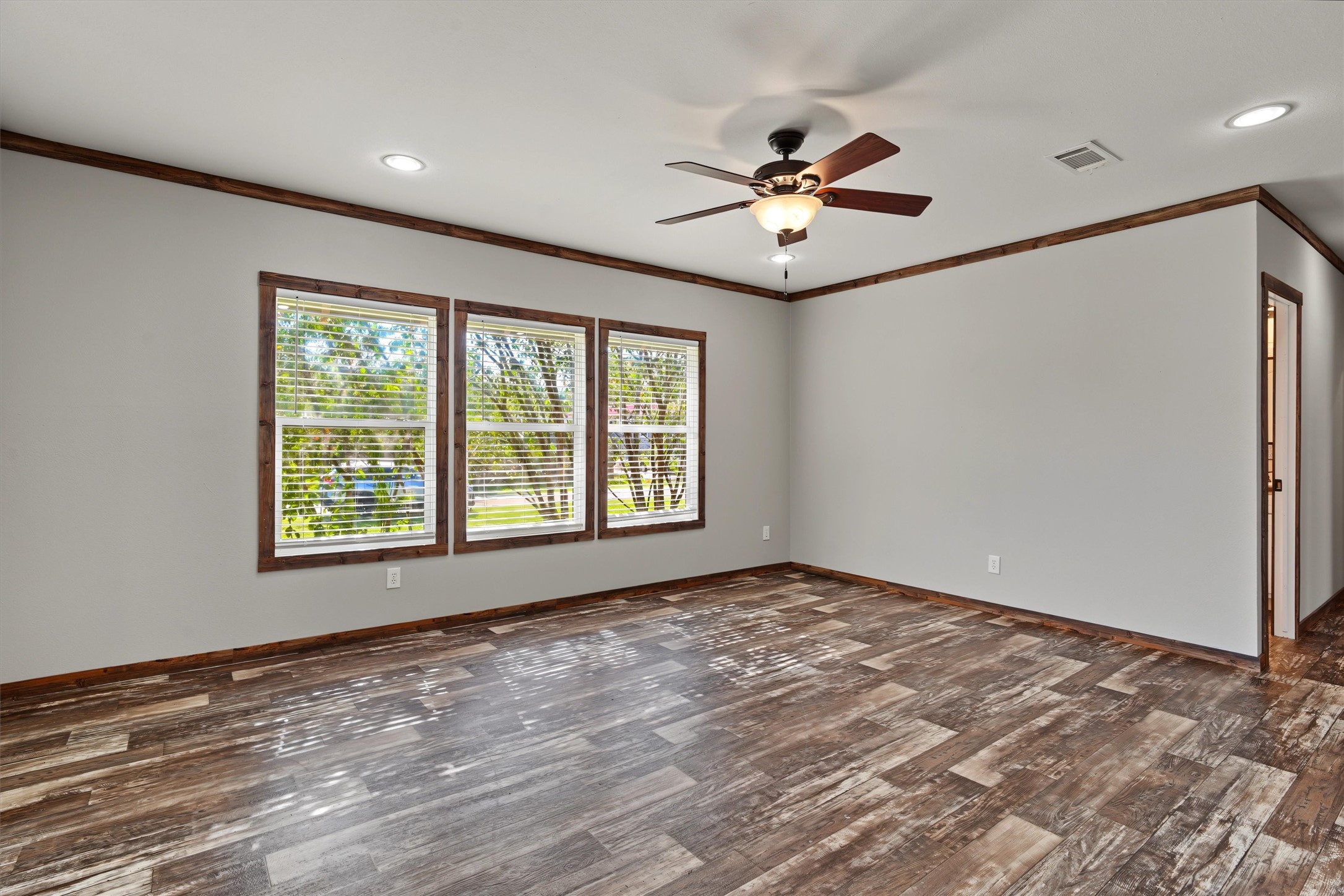 Spacious Open-Concept Living Area  A bright, oversized living space filled with natural light and designed for effortless everyday living, entertaining, and gathering with family and friends