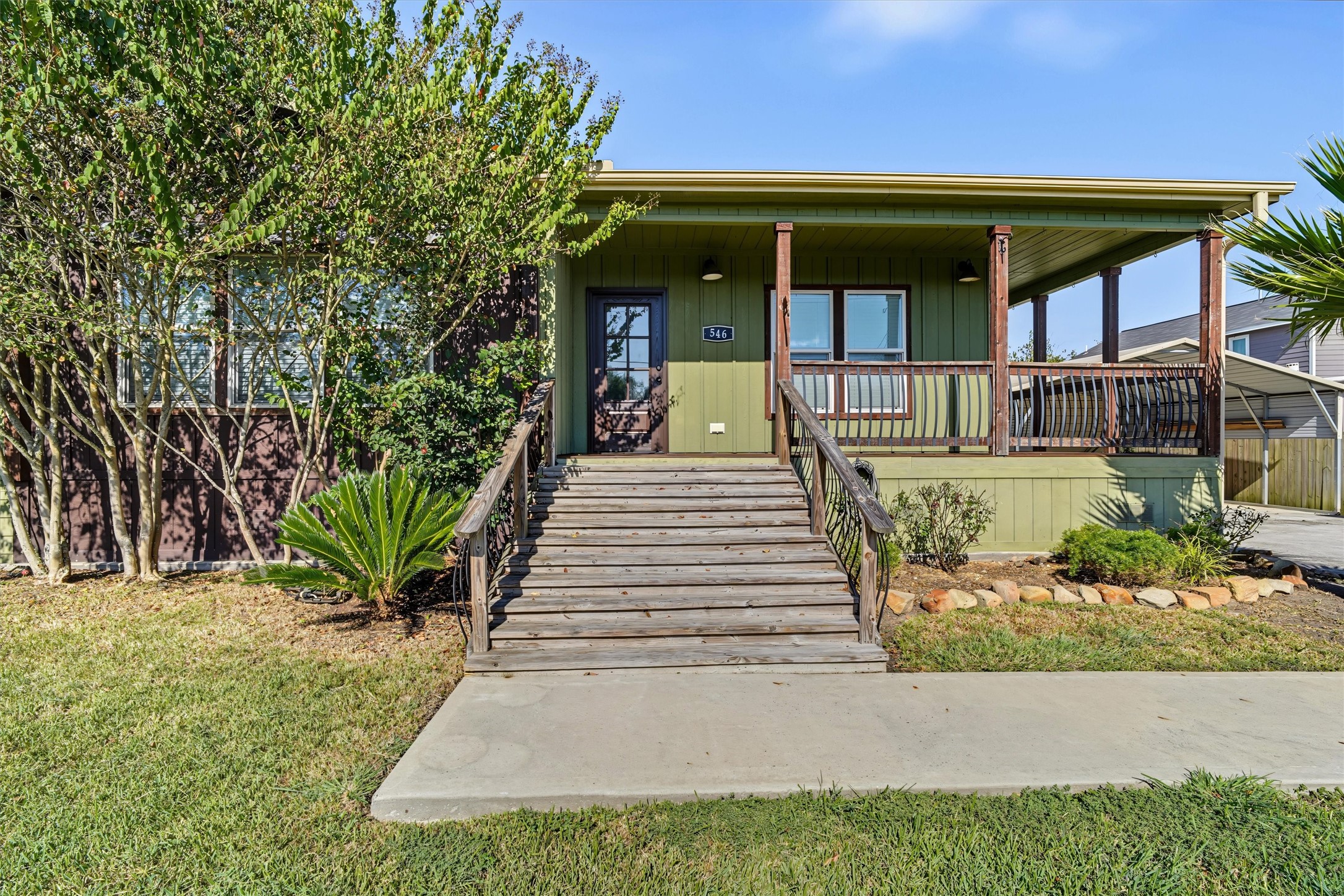 Wraparound Corner Porch Spacious corner porch offering plenty of room to relax, enjoy the outdoors, and welcome guests Wraparound Corner Porch Spacious corner porch offering plenty of room to relax, enjoy the outdoors, and welcome guests