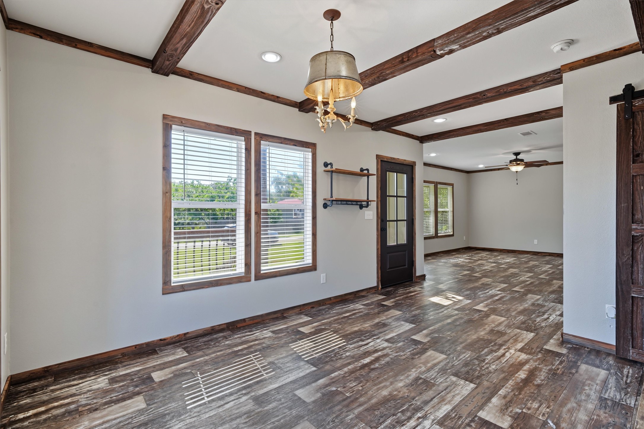 View from dining room of the front door and the large living area