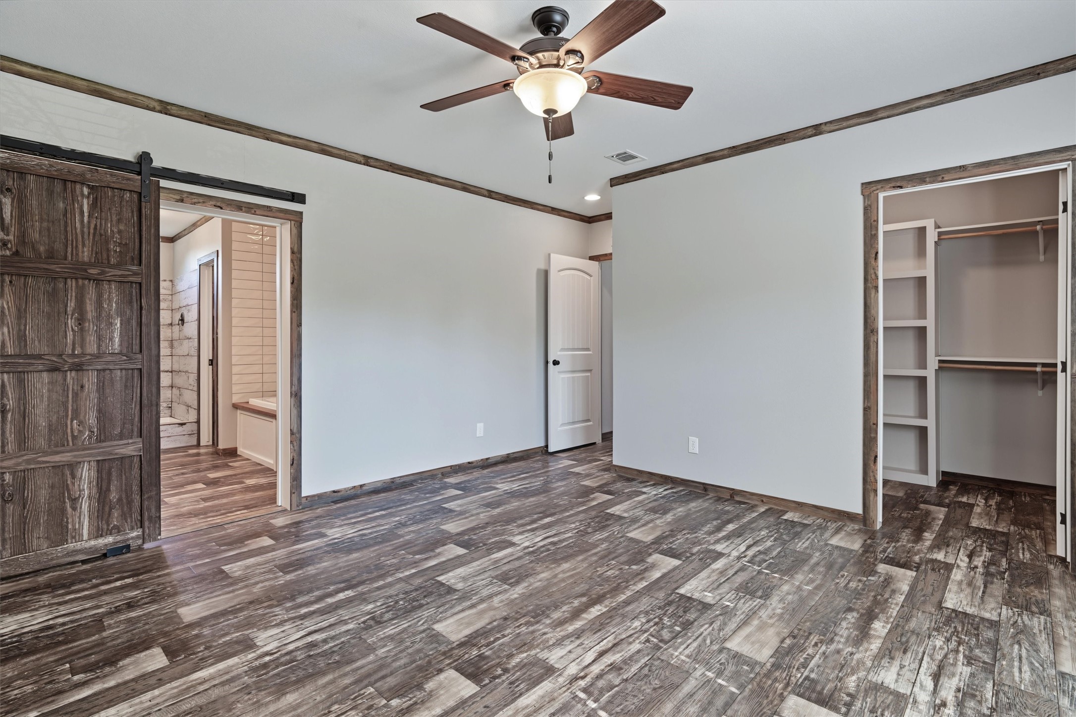 Spacious Primary Suite  Generously sized walk-in closet and a large ensuite bathroom create a comfortable and private primary retreat with plenty of space and convenience