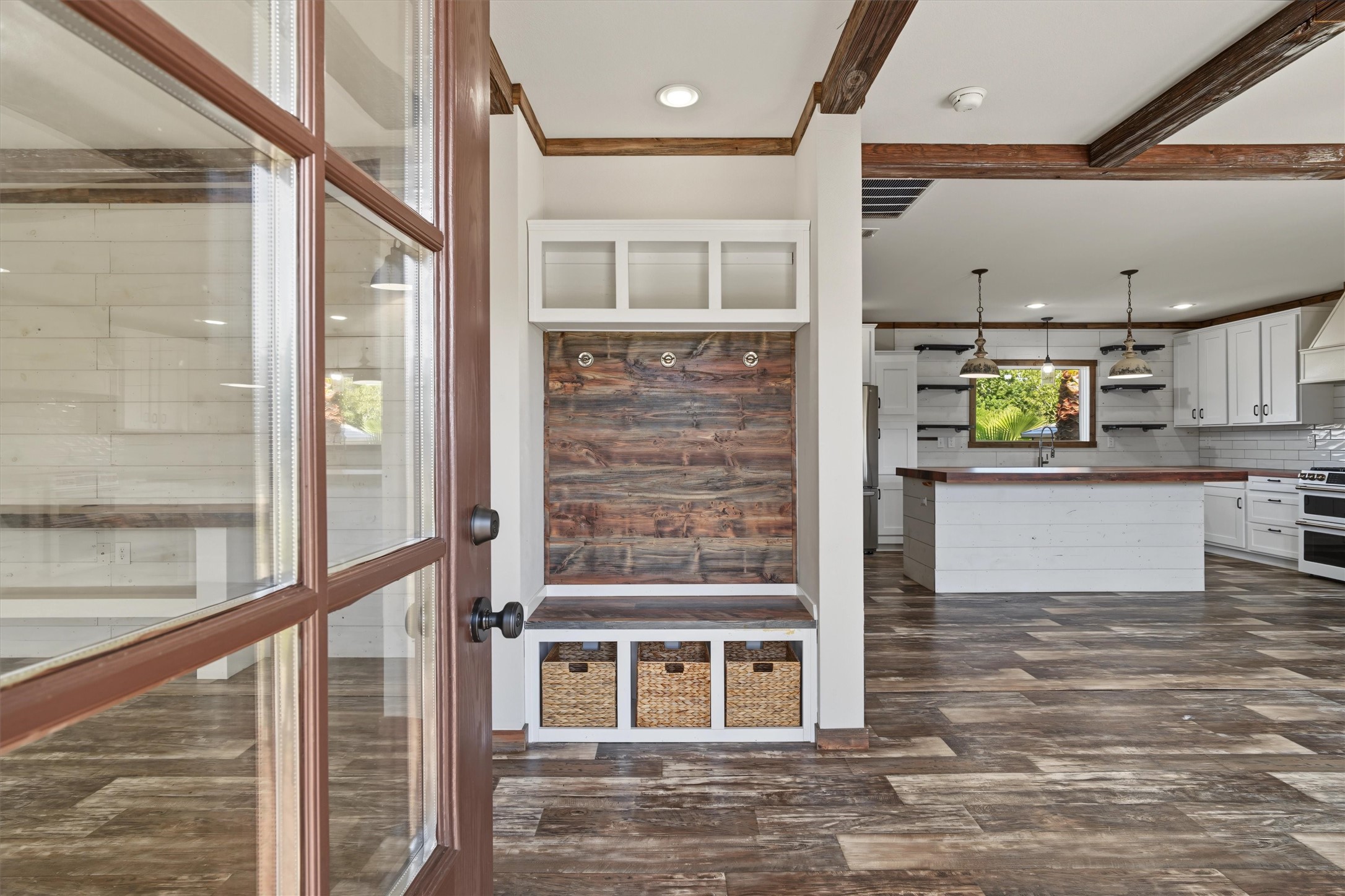 Welcoming Entry & Family Drop Zone  Step inside to a thoughtfully designed storage area perfect for organizing kids backpacks, sports gear, shoes, and everyday essentials