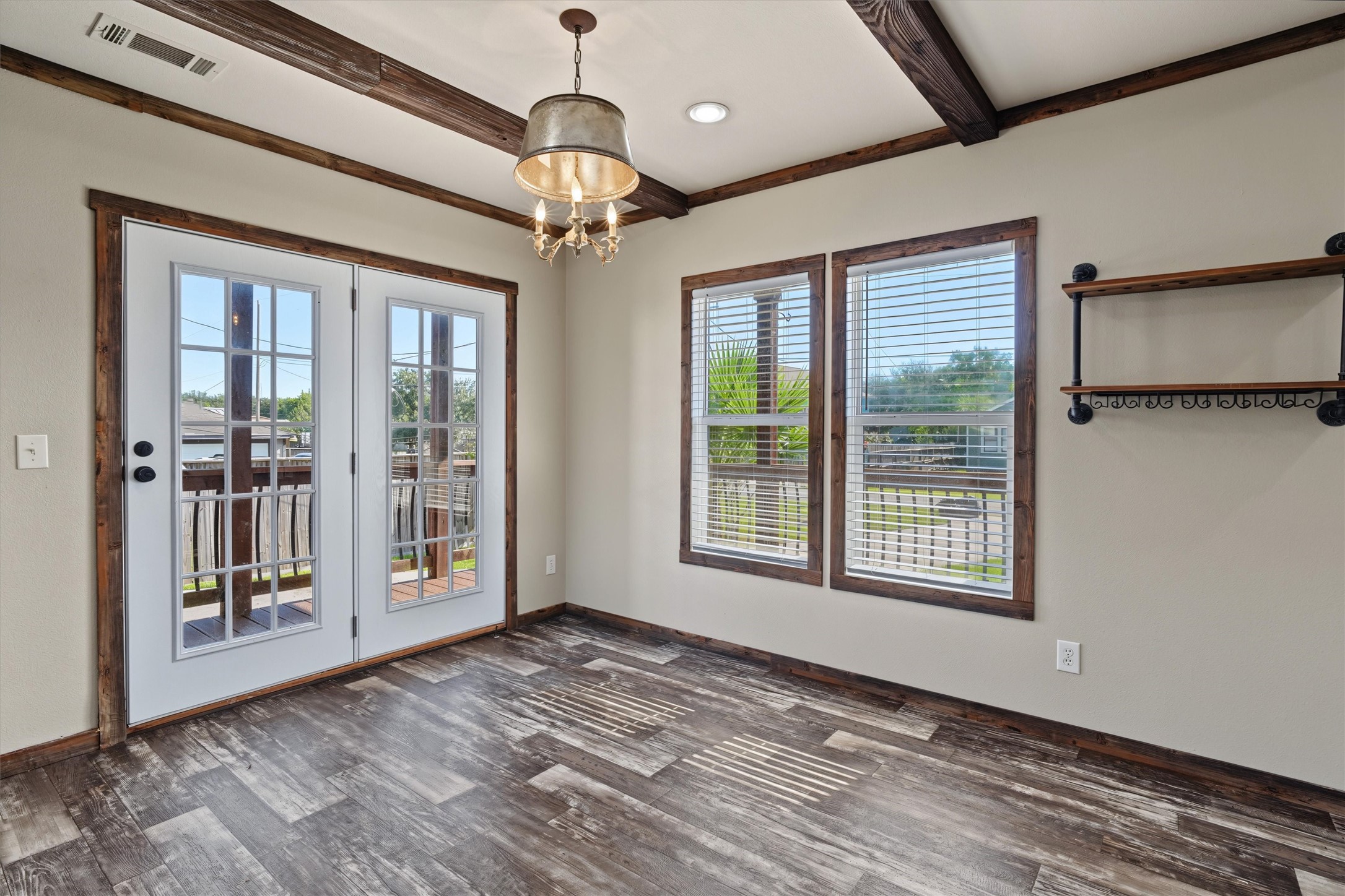 Bright Corner Dining Room  A spacious corner dining area filled with natural light, offering plenty of room for family meals, holiday gatherings, and entertaining