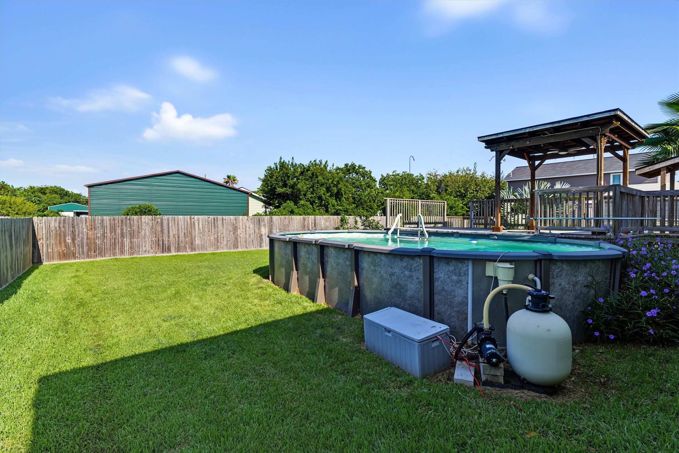 Oversized Above-Ground Pool  A fantastic backyard feature offering plenty of room to cool off, relax, and create unforgettable summer memories with family and friends
