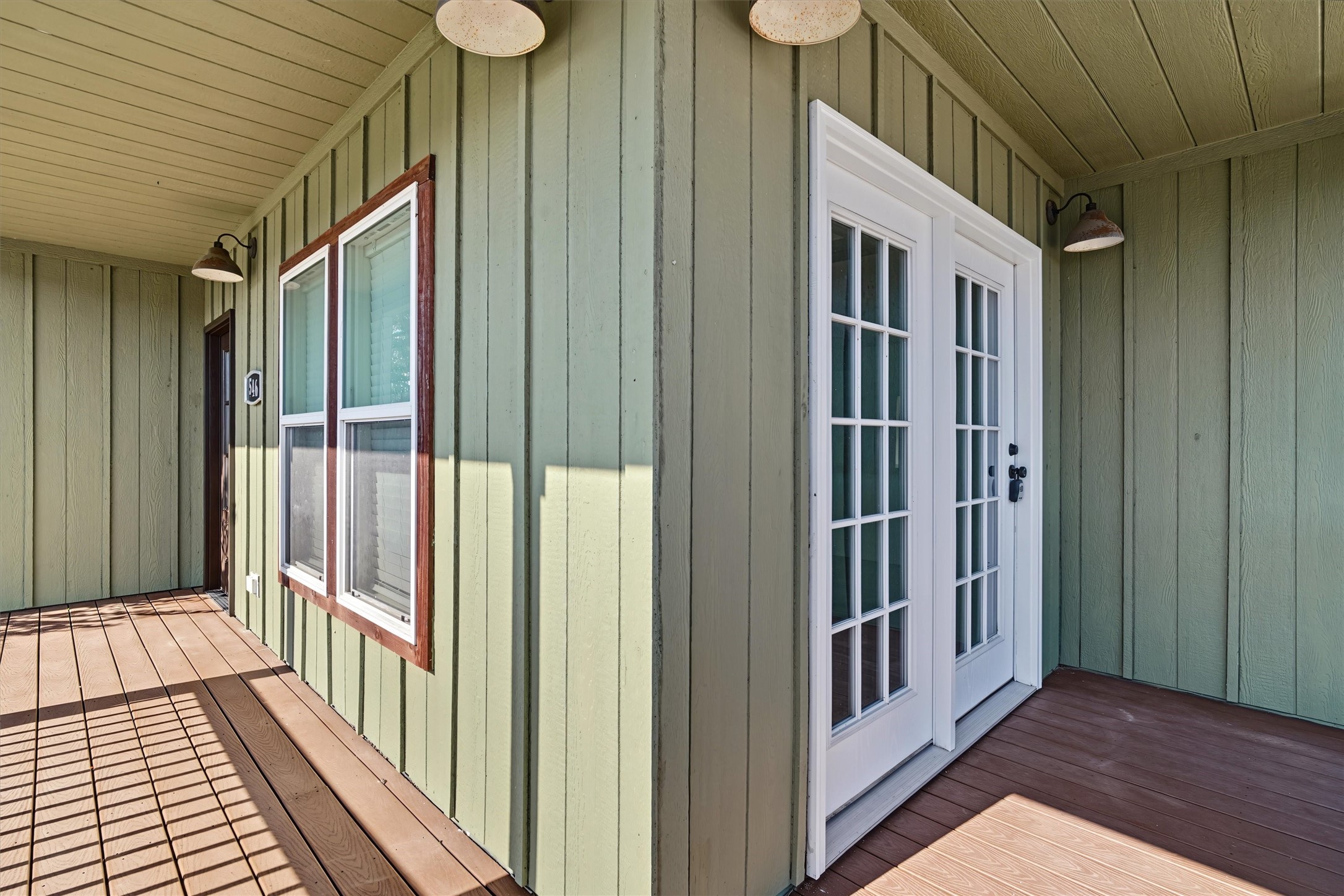 The side door enters into the dining area of the home