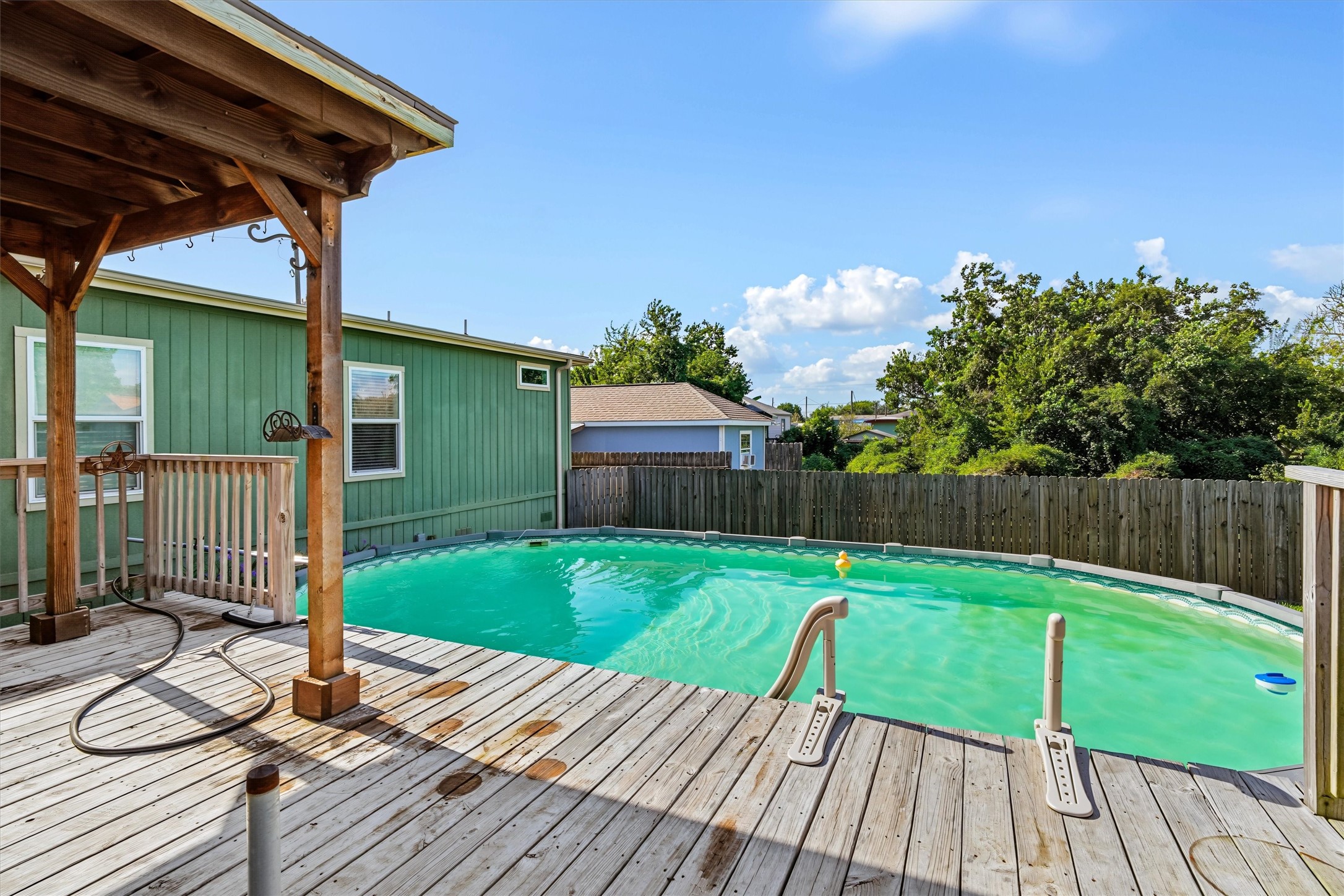 Cannonball, Anyone?  This oversized pool is ready for summer fun, backyard parties, and plenty of cannonballs! Grab your swimsuit and make a splash! Enjoy the deck area and relax