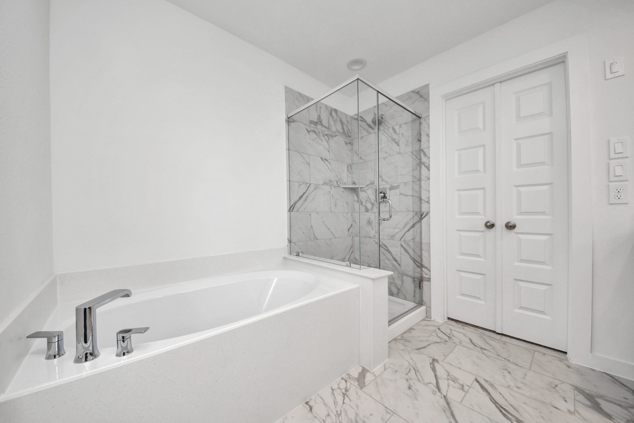 Generously sized secondary bedrooms featuring spacious closets, soft and inviting carpeting underfoot, large windows allowing plenty of natural light, and the added touch of privacy blinds for your personal retreat. Sample photo of completed home with similar floor plan. Actual colors and selections may vary.