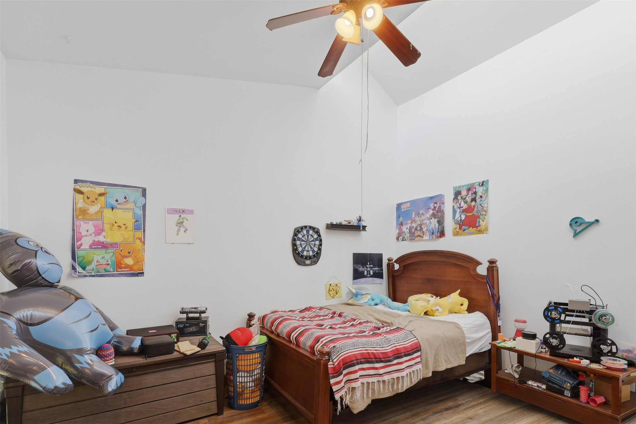 High architectural peaks give this comfortable secondary bedroom an open, roomy feel with plenty of space to spread out.