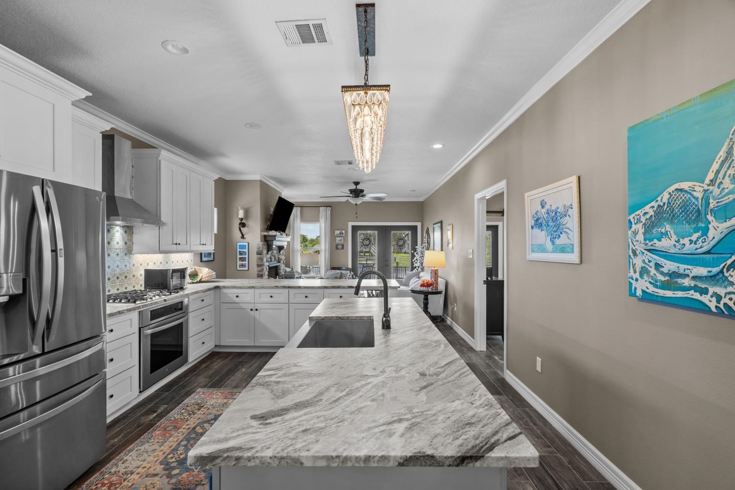 an oversized island and farmhouse sink
