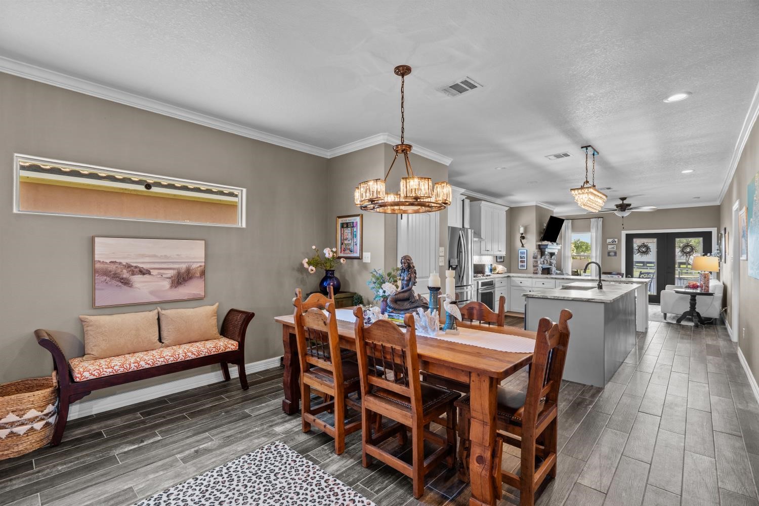 Wood like tile floors throughout the home, neutral paint colors, and upgraded, stylish light fixtures you are sure to love Wood like tile floors throughout the home, neutral paint colors, and upgraded, stylish light fixtures you are sure to love