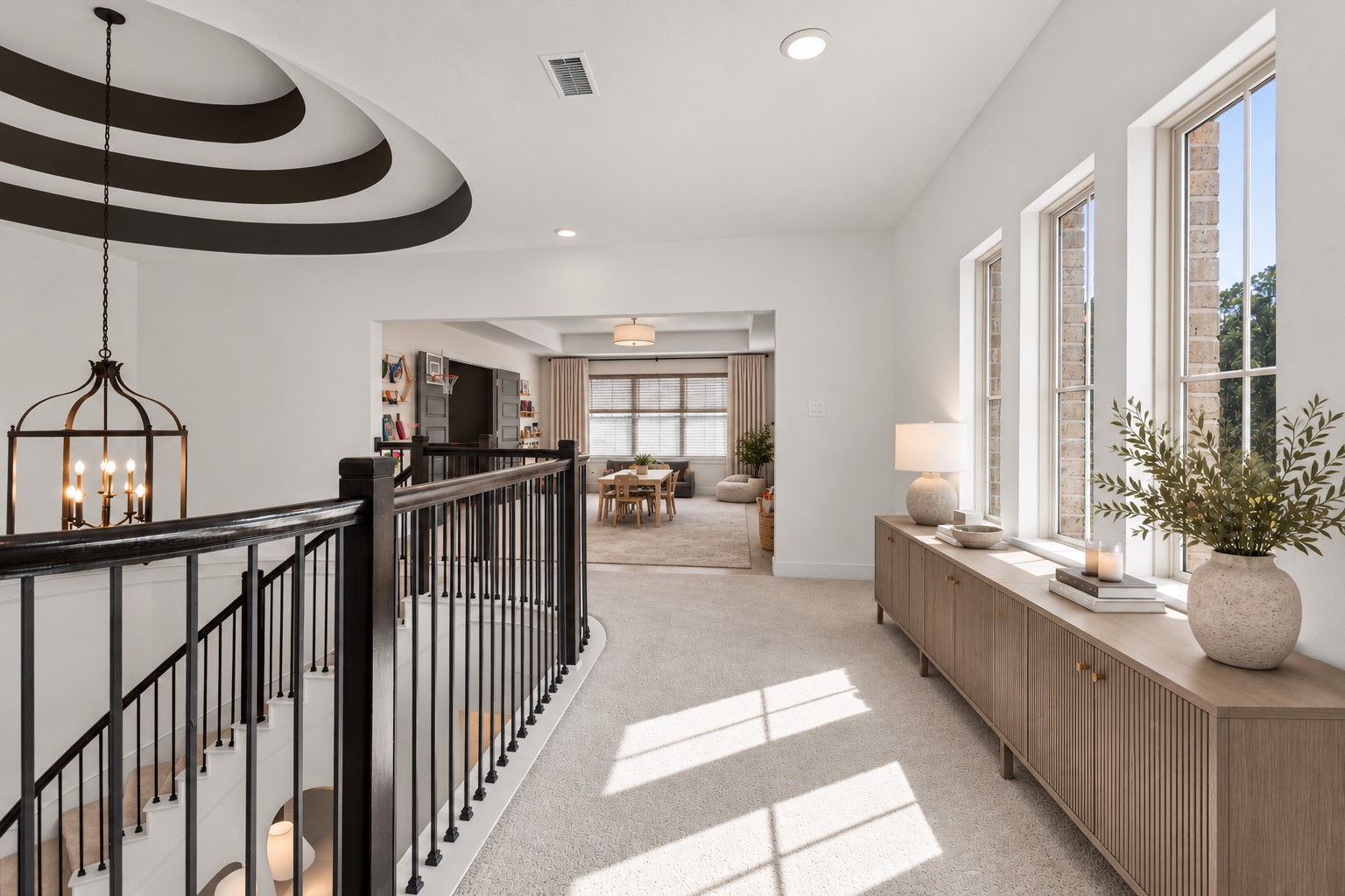 Thoughtfully designed upstairs layout featuring a spacious game room and dedicated media room on one end, with secondary bedrooms and baths privately situated on the opposite endoffering the perfect balance of entertainment, comfort, and privacy.