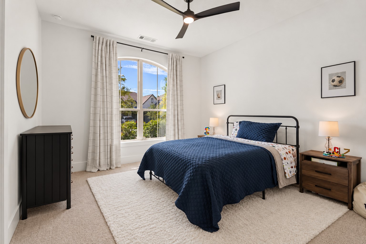 Beautifully appointed secondary ensuite bedroom conveniently located on the main level, offering comfort, privacy, and a luxurious retreat for family or overnight guests.