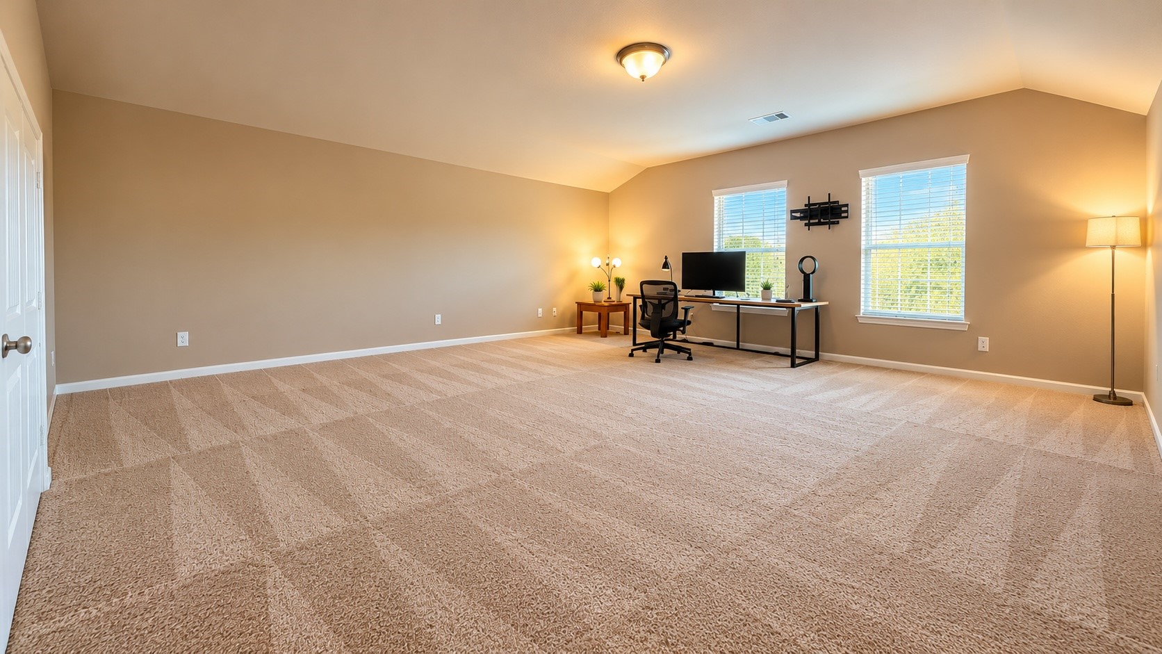 Expansive upstairs game room offers plenty of space for a second living area, media room, or family gathering space!