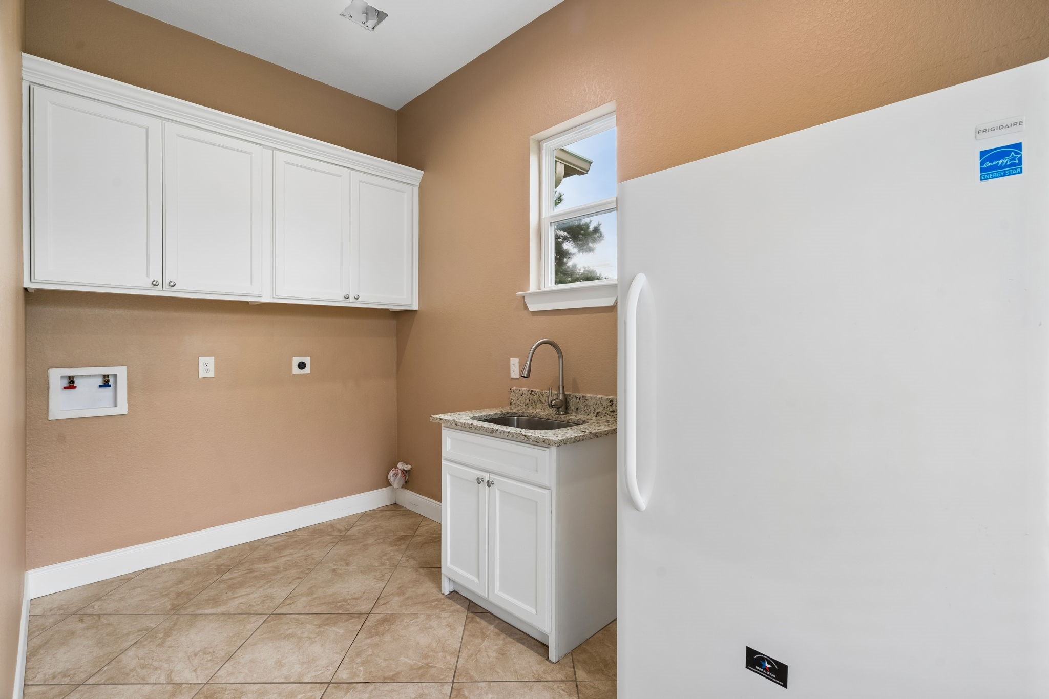 Laundry and Freezer area