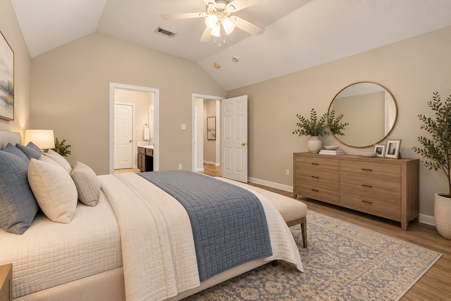 The private primary suite features an en-suite bath with double sinks, soaking tub and separate walk-in shower.