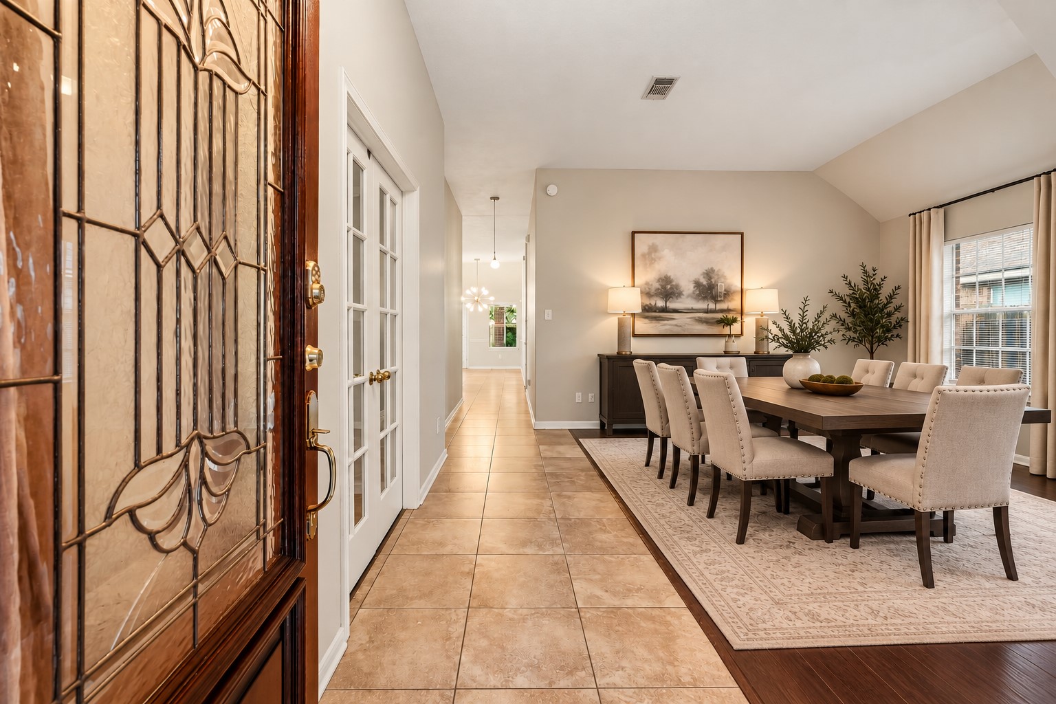 A spacious formal dining room provides the perfect setting for entertaining or can serve as a flex space.