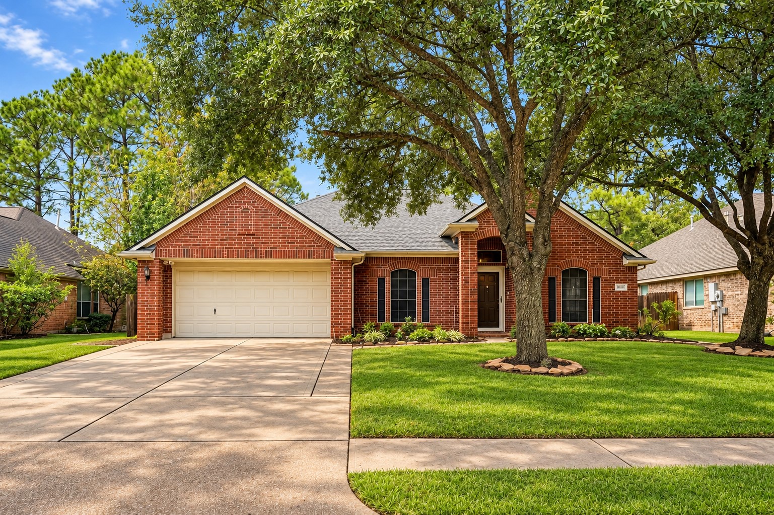 Nestled among mature trees, this inviting single-story home offers a desirable split floor plan, high ceilings and a fresh, neutral color palette throughout.