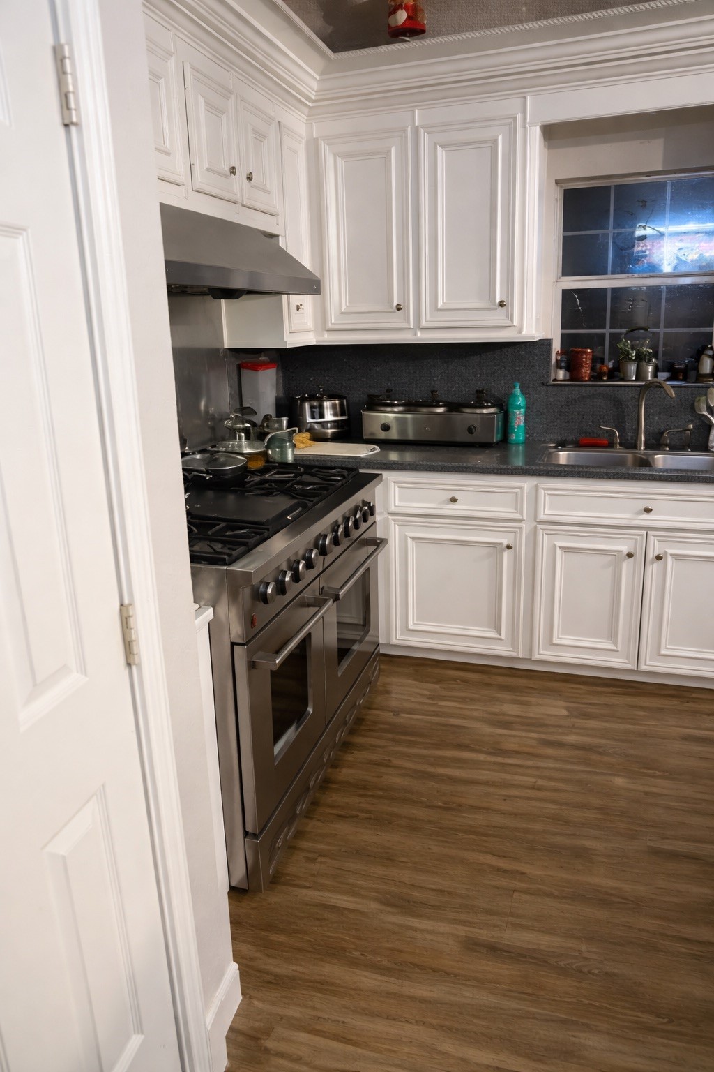 Kitchen with white cabinetry