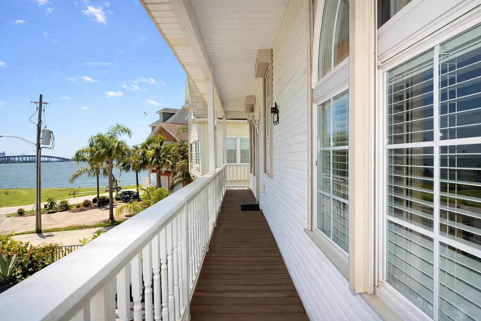 Covered balcony with water views Covered balcony with water views