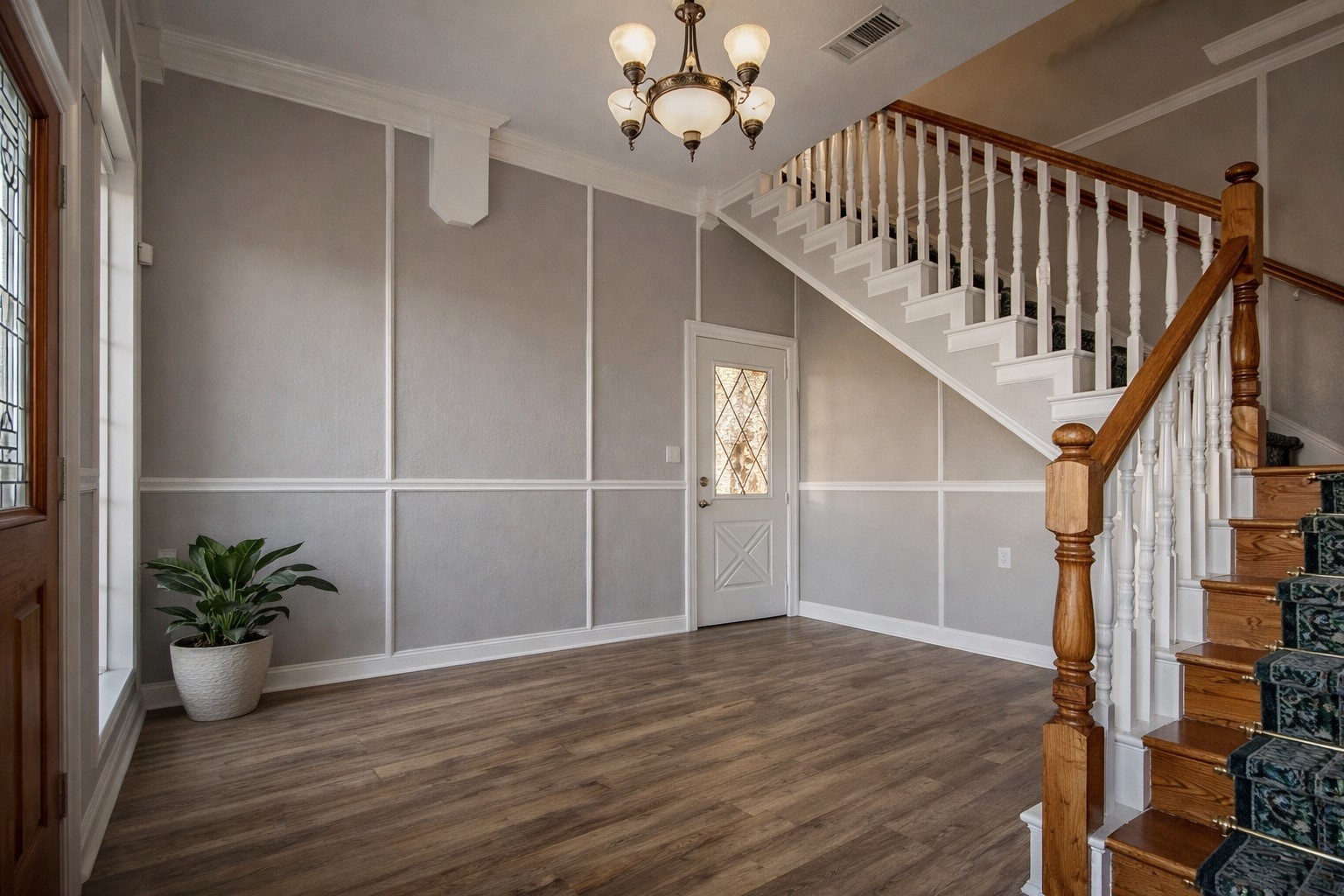 Entry foyer with staircase Entry foyer with staircase