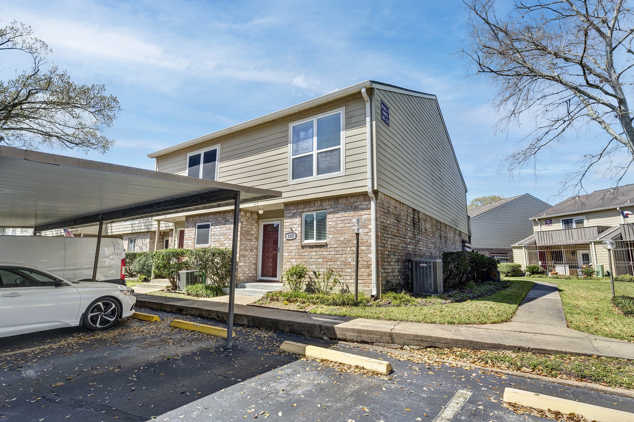 AVAILABLE 12/3/26: 5005 Georgi Ln. #165... Two story, 2 bedroom/2.5 bathroom condo in Oak Forest West. Two pools, clubhouse and other community amenities. Rent includes water plus refrigerator/washer and dryer. Security system in place (tenant to be responsible for activation/service).with updates galore and covered parking right outside your door.