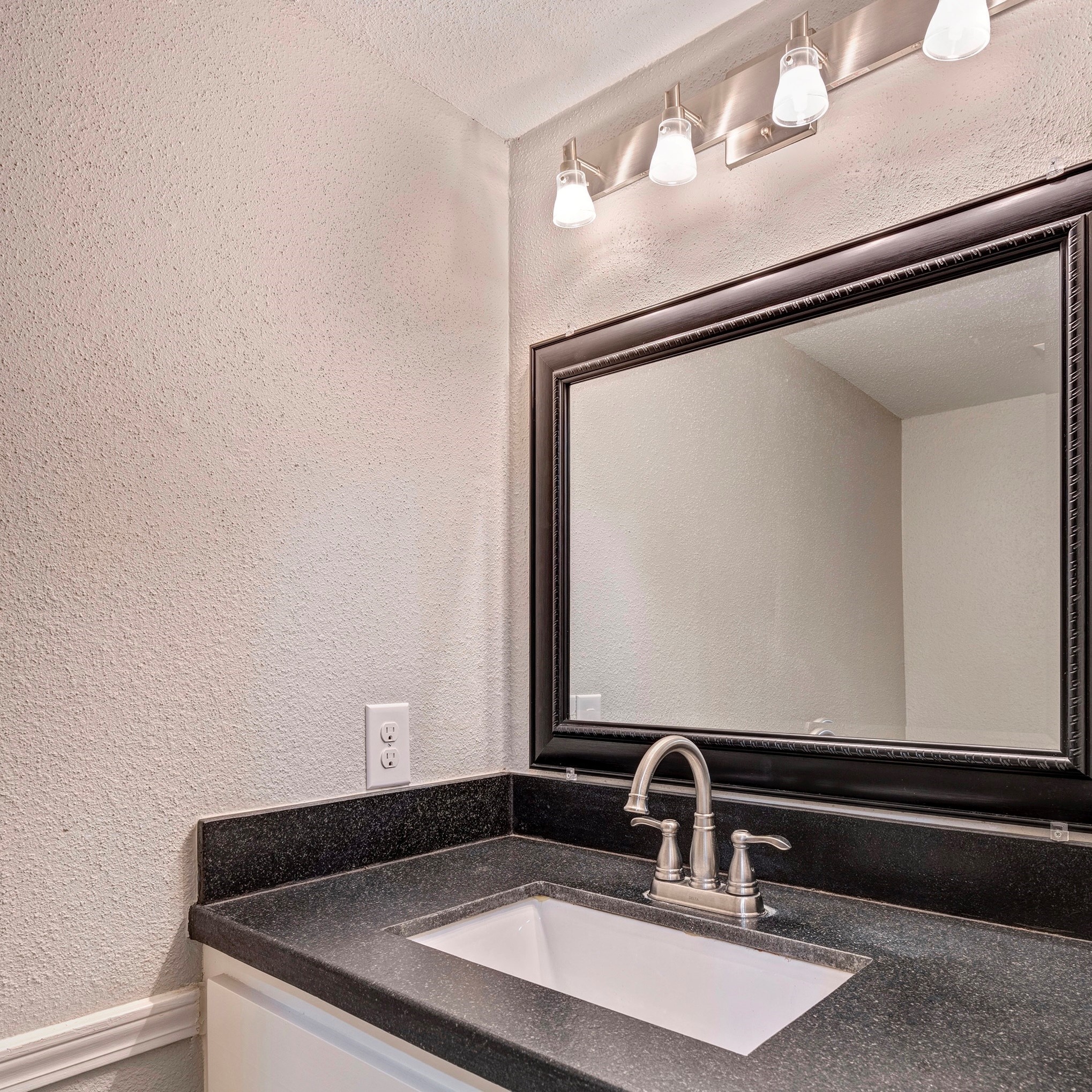Downstairs powder bath. There is also a large storage closet downstairs.