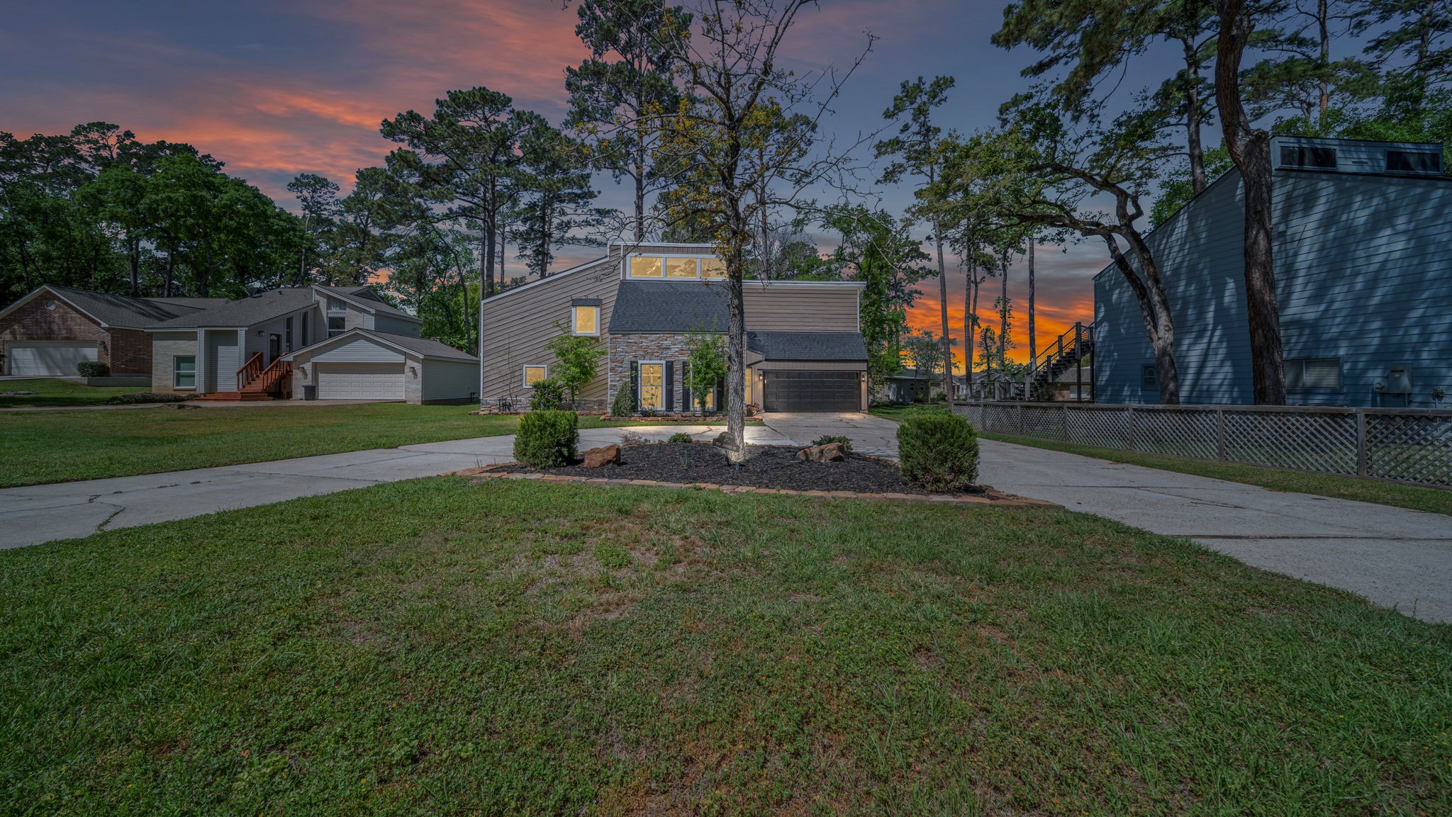 Virtually staged.  Come experience beautiful sunsets at the lake!  (Tree in foreground and the one at left window were recently removed)