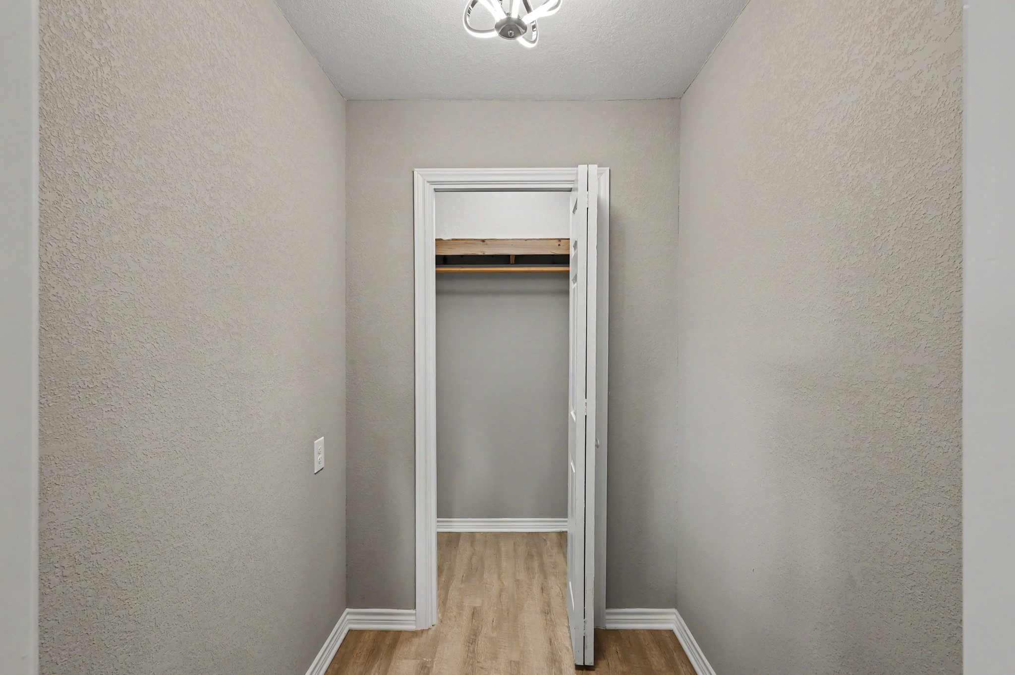 The primary closet has a closet within a closet! Cedar shelving in the back closet and fully open front area for your custom design. Make this a changing area, style room with floor mirror, bench and armoire, or add more rods and shelves!