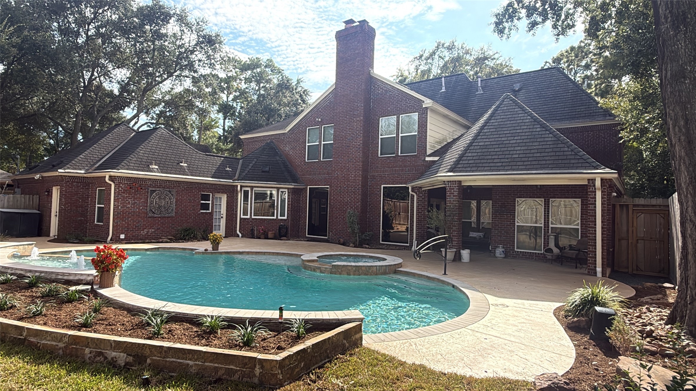 SPARKLING REMODELED POOL AND COVERED PATIO - ALL BRICK HOME!