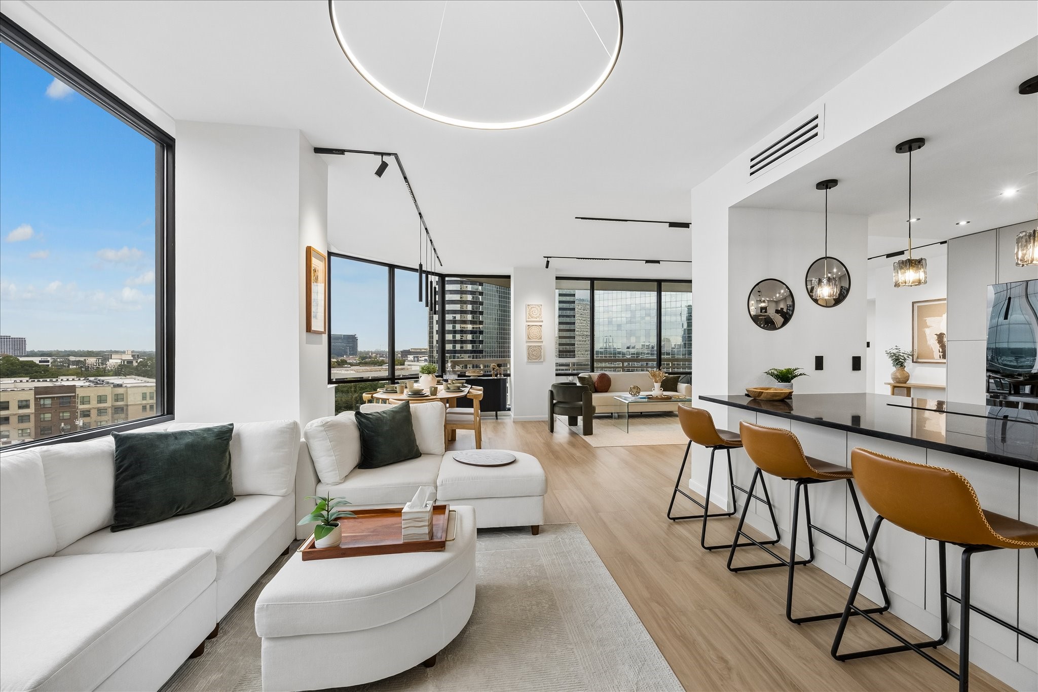 Long sightlines connect the family room, dining area and main living space.