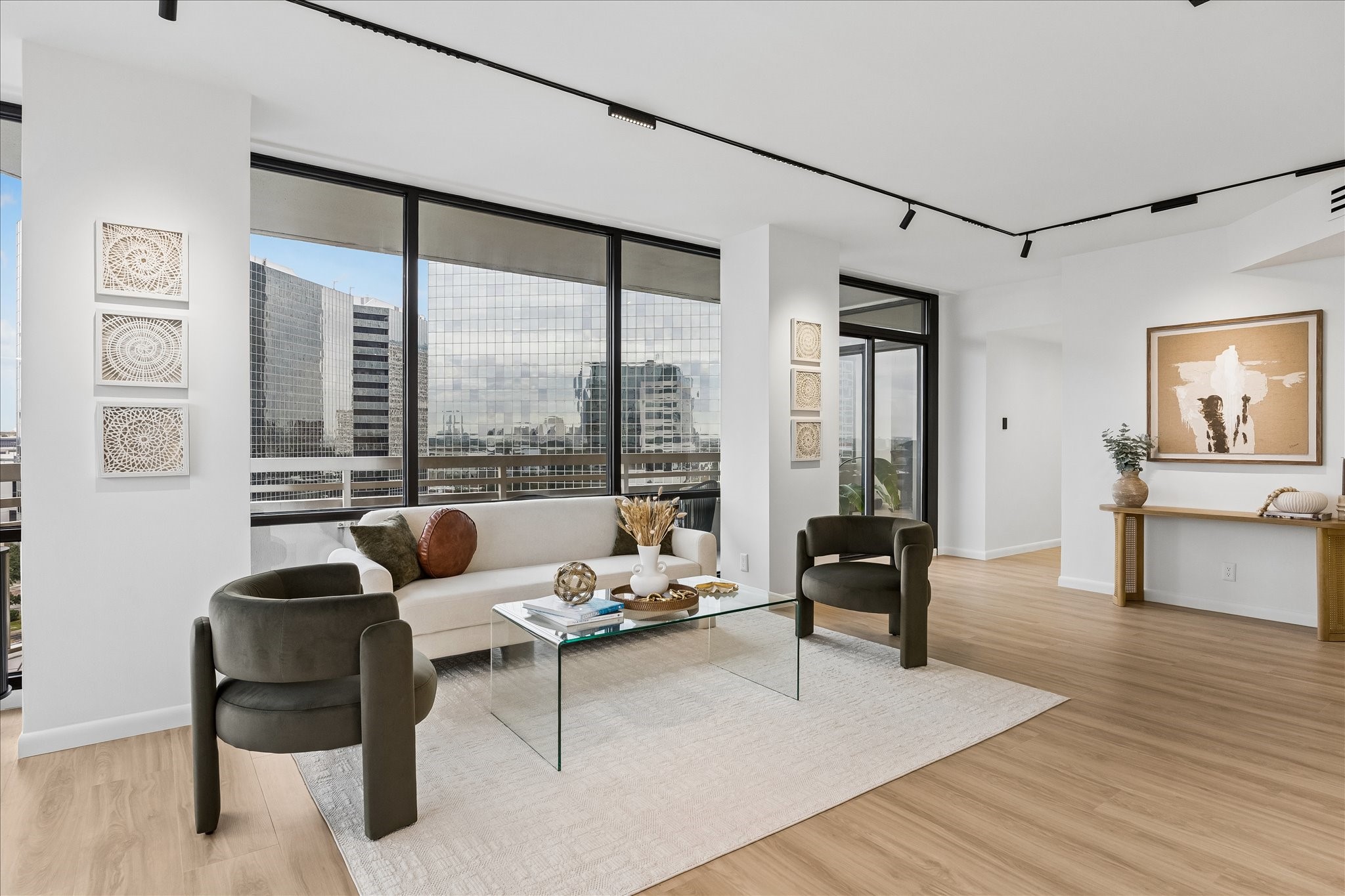 Magnetic track lighting with interchangeable elements provides flexible illumination across the living area. Magnetic track lighting with interchangeable elements provides flexible illumination across the living area.