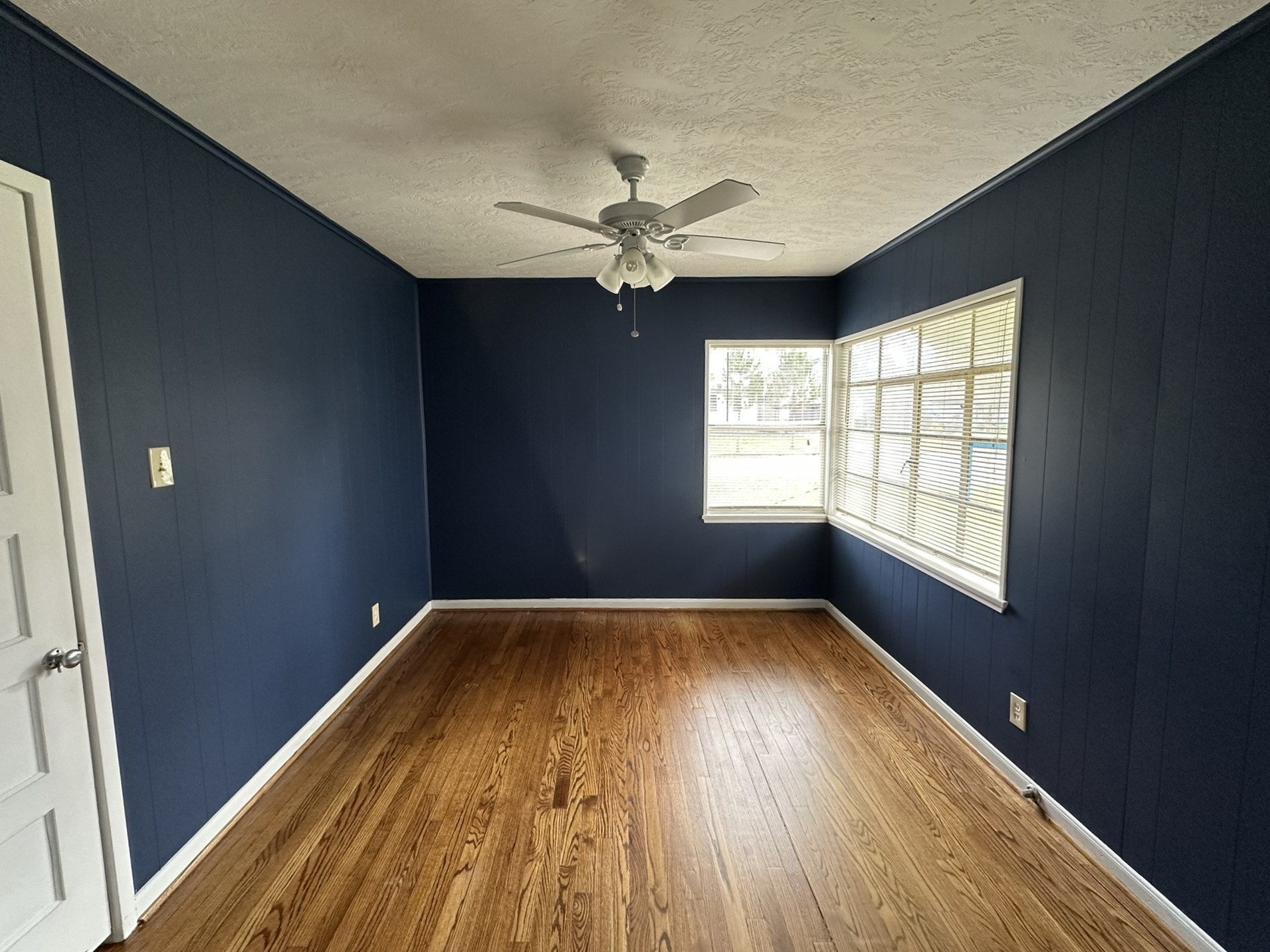 Bedroom #3 also has great natural light, ceiling fan and beautiful hardwood floors.