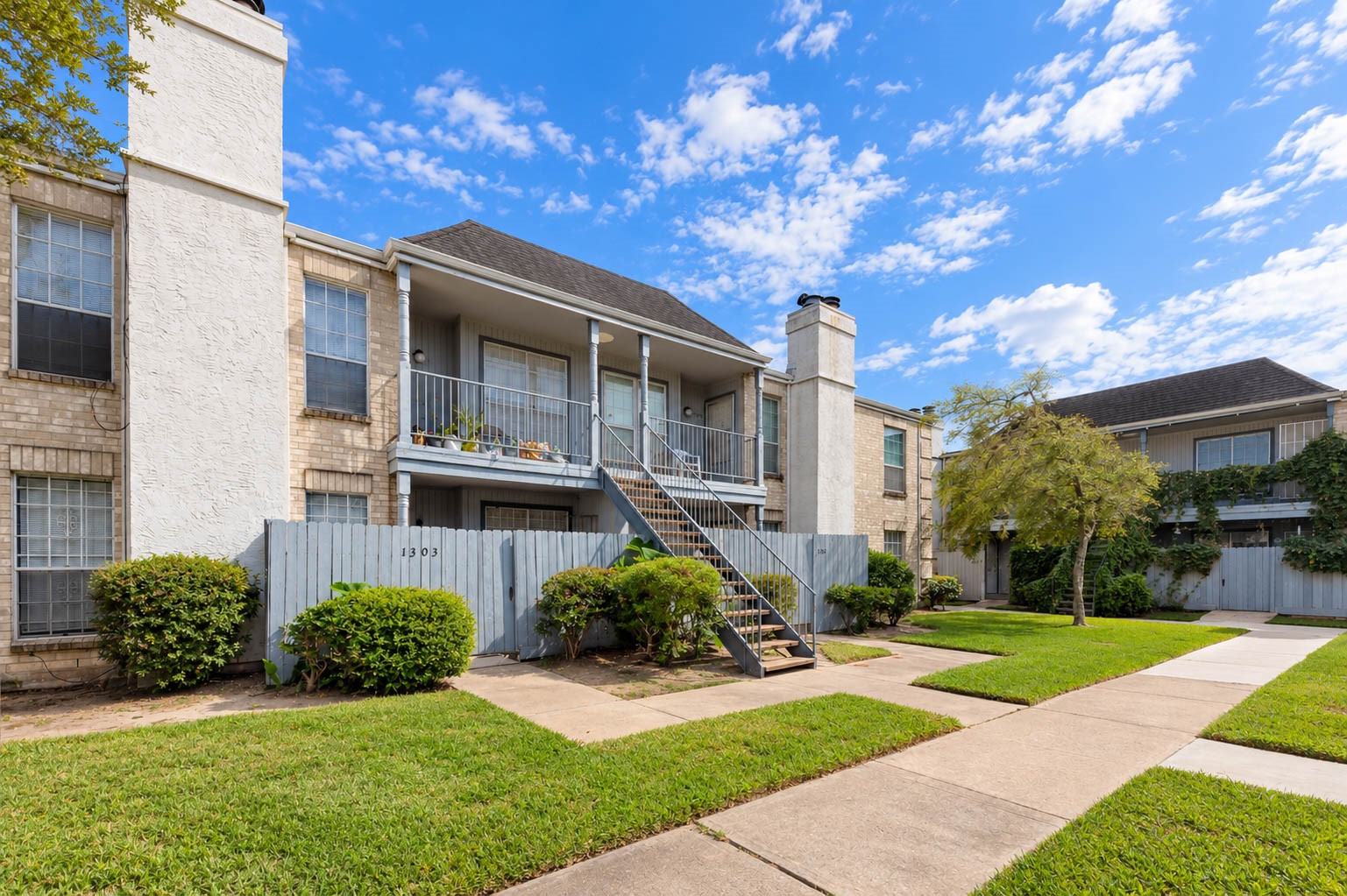 Welcoming community exterior with landscaped green spaces, mature trees, and convenient pedestrian walkways. Welcoming community exterior with landscaped green spaces, mature trees, and convenient pedestrian walkways.