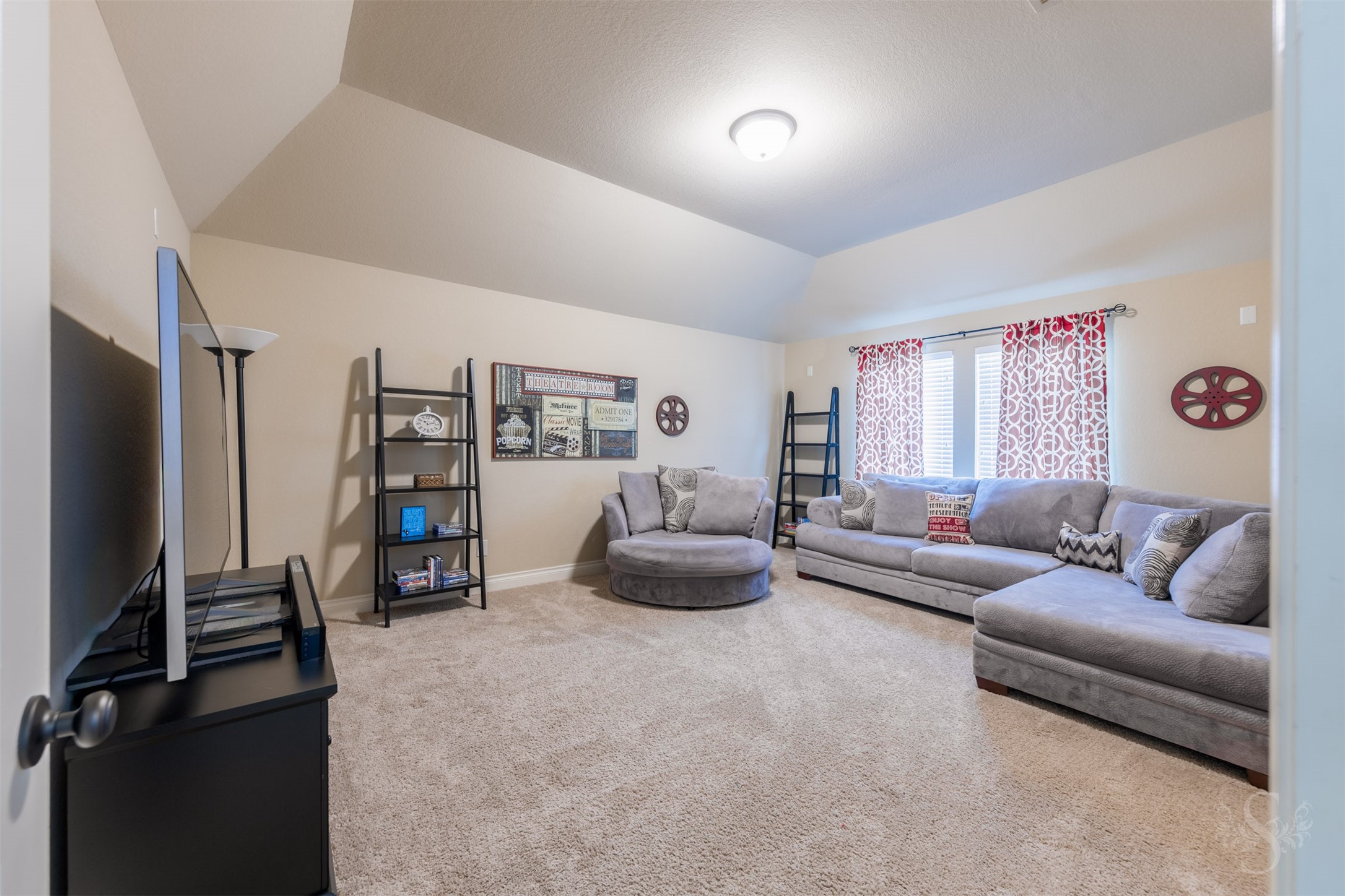 Enjoy favorite films and game-day excitement in the separate upstairs media room, with ample space for comfortable lounge seating. This inviting retreat makes it easy to settle in for a relaxing evening or host friends for movie night.