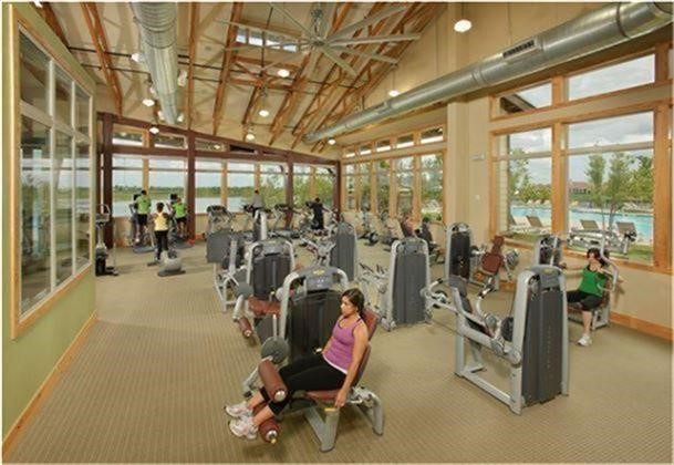 Included in your HOA dues is access to the 6,500 square foot fitness center with top of the line equipment and personal trainers onsite! Lovely water and pool views surround. Various exercise classes are also available. Great way to begin or end the day!