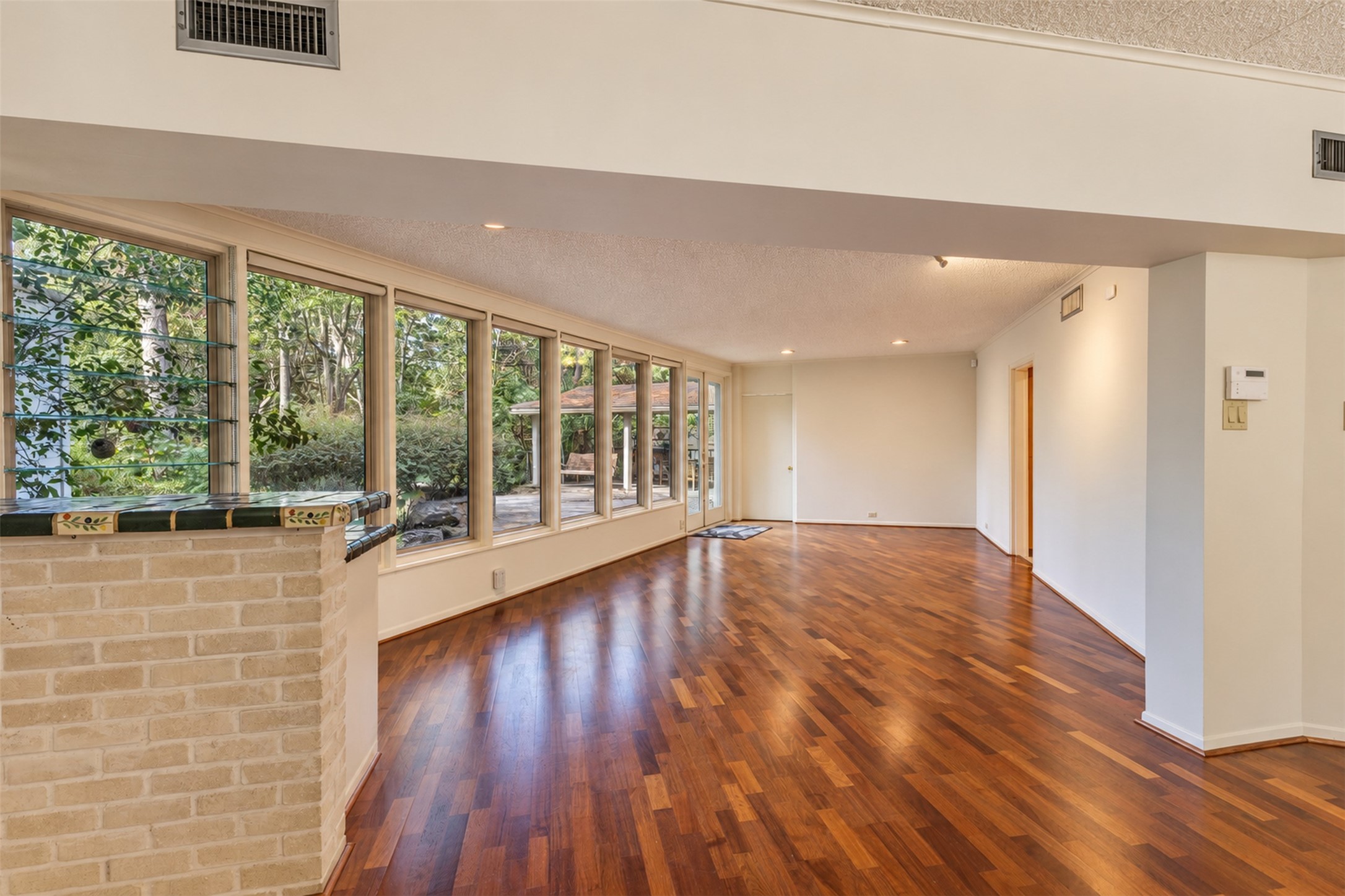 The home feels surrounded by nature.