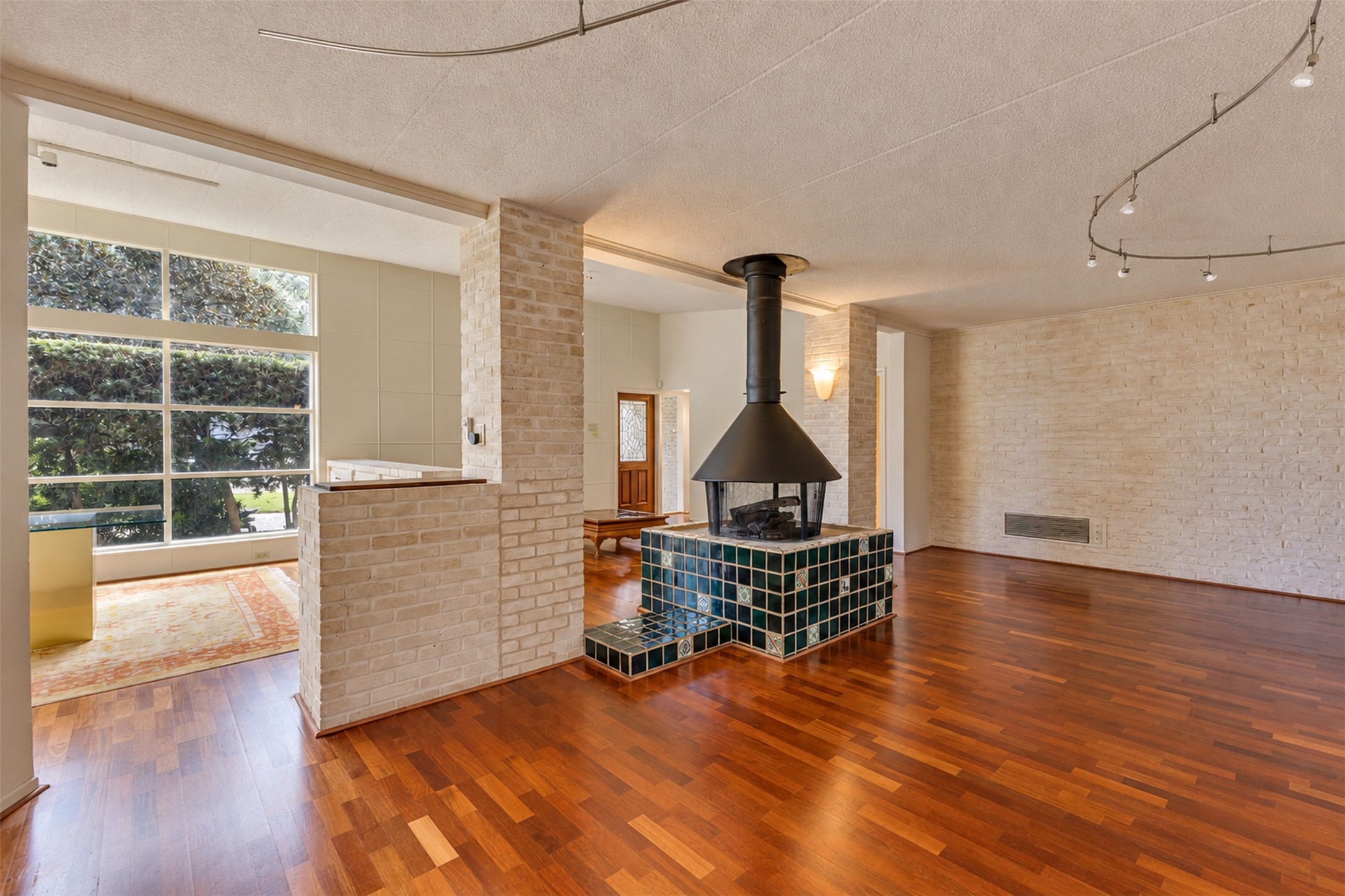A view of the living room towards the front door.