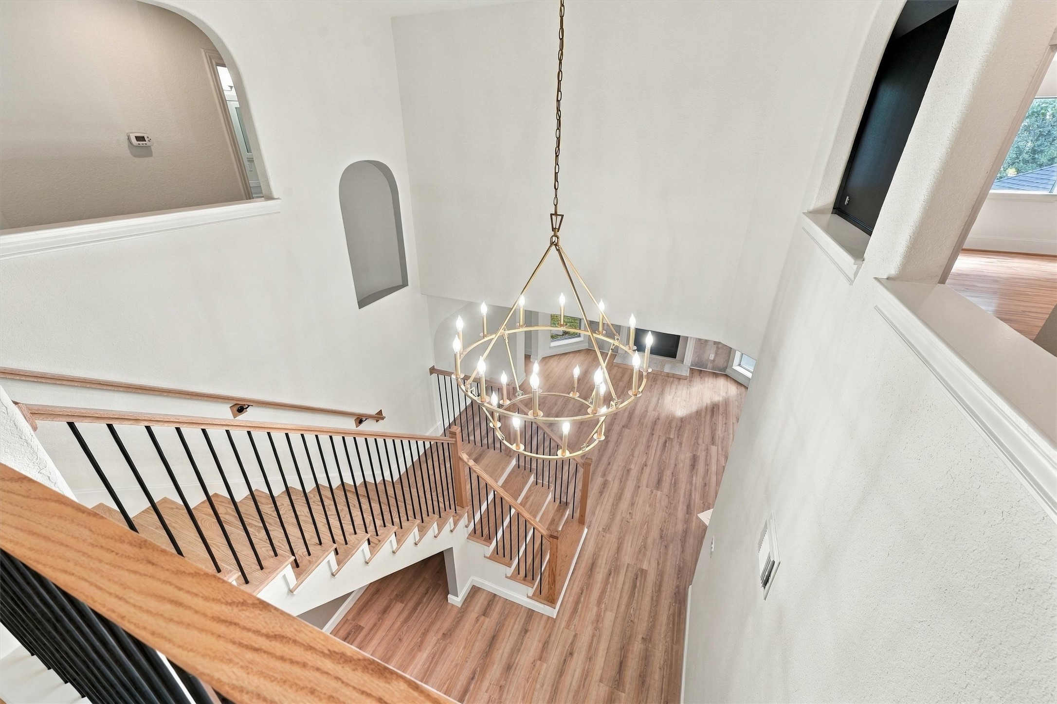 Iron and wooden staircase leading to upstairs